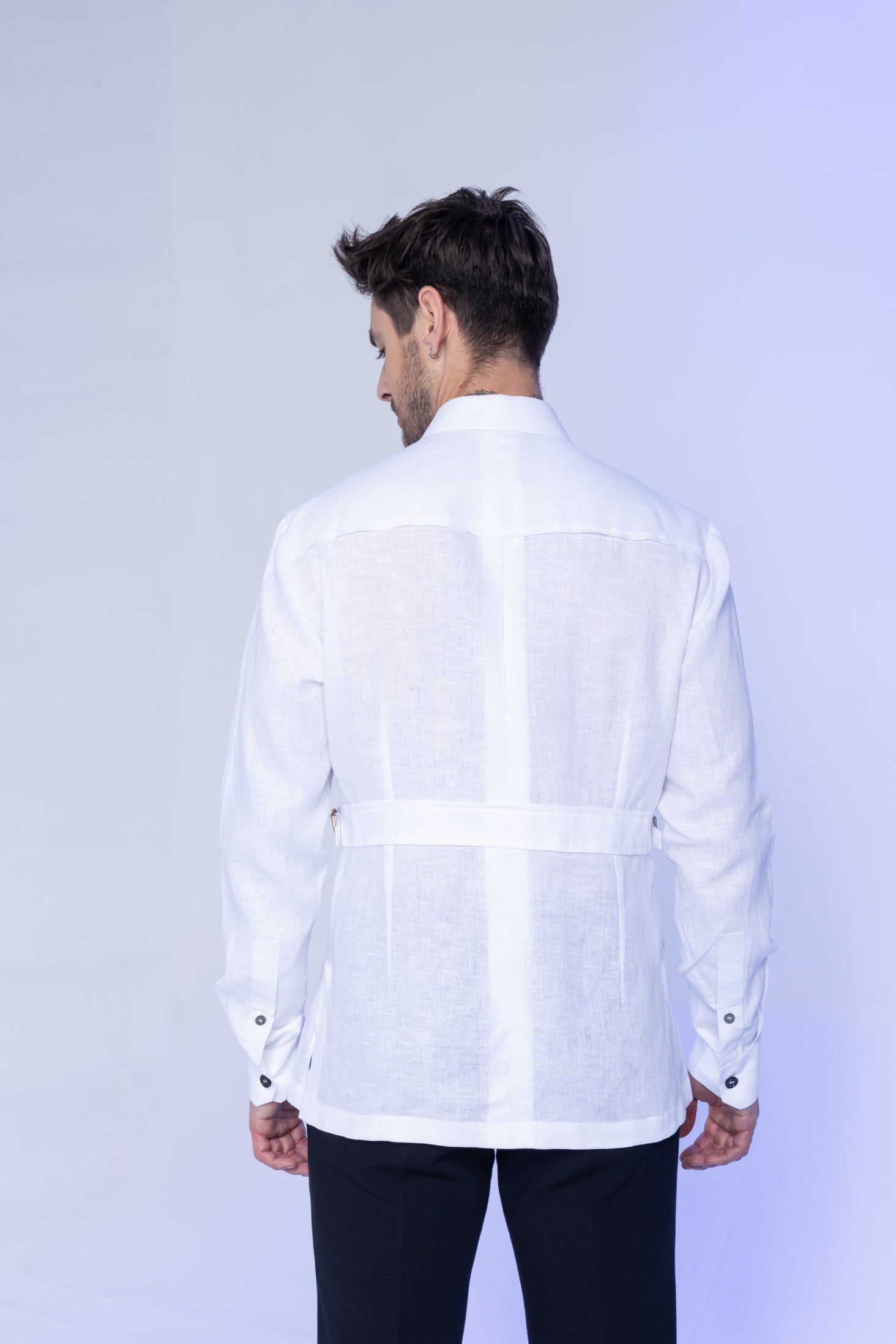 White full sleeved linen shirt with 4 patch pockets and buckle detailing on sides