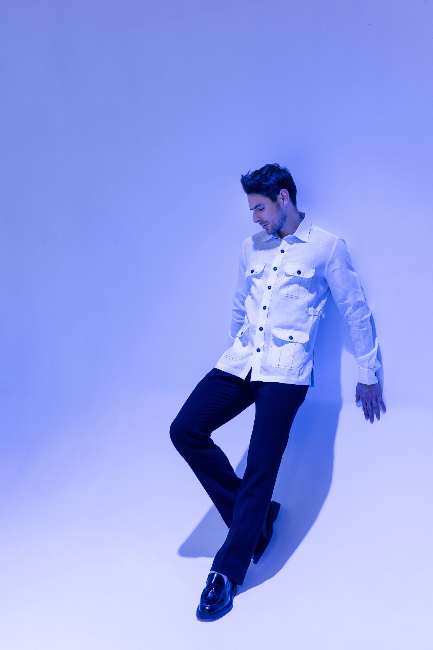 White full sleeved linen shirt with 4 patch pockets and buckle detailing on sides