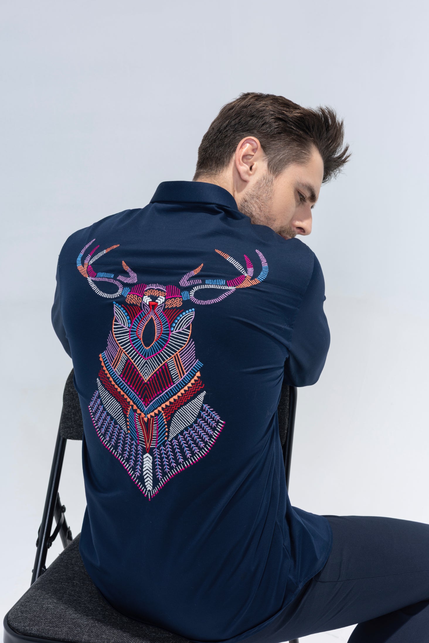 Navy Blue full sleeved shirt with embroidered multi-color Reindeer motif