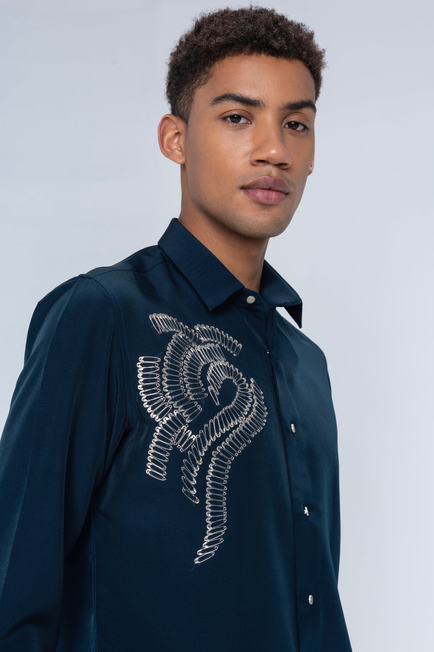Buy Branded Dark turquoise shirt embellished with safety pins