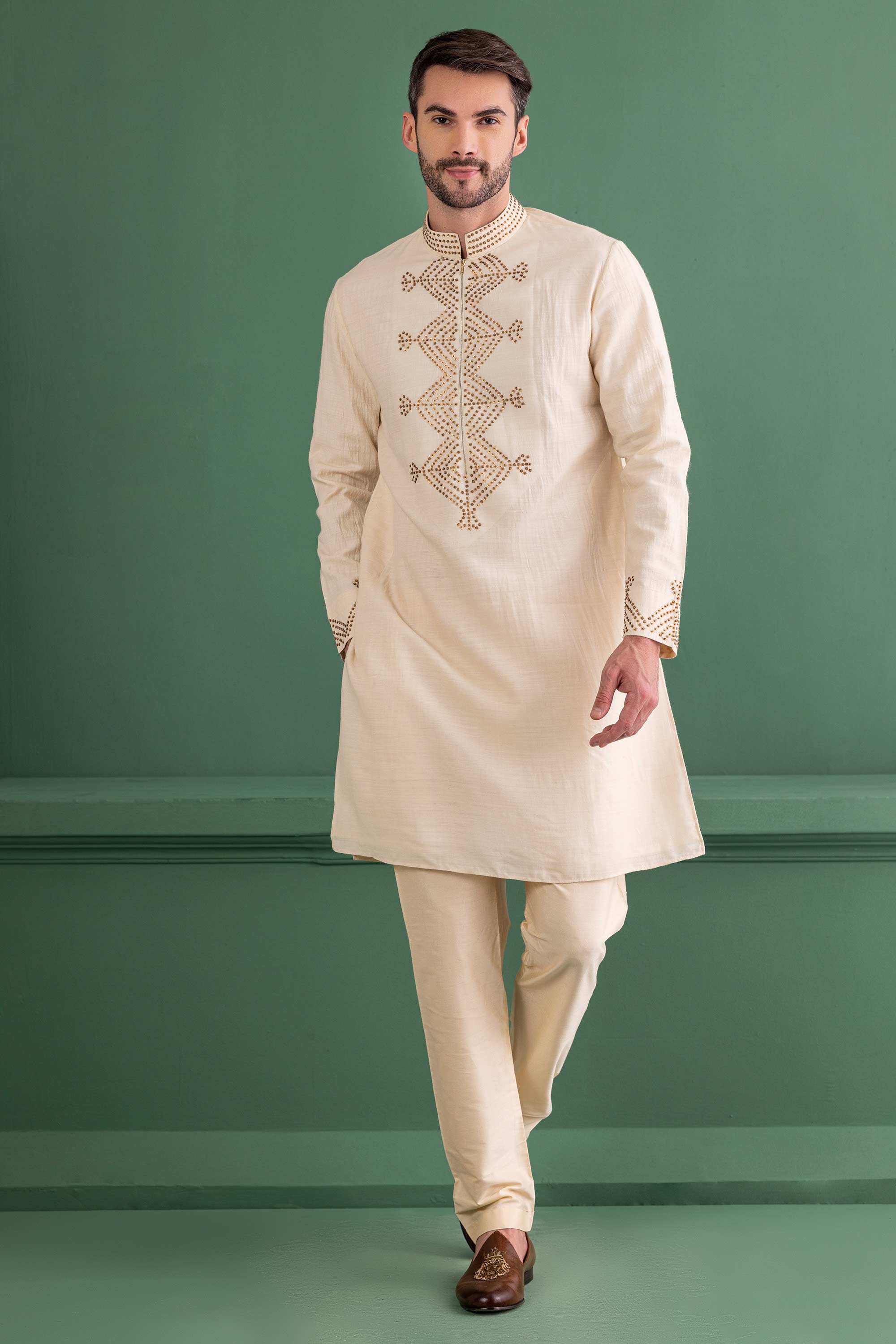 cream kurta with metal work