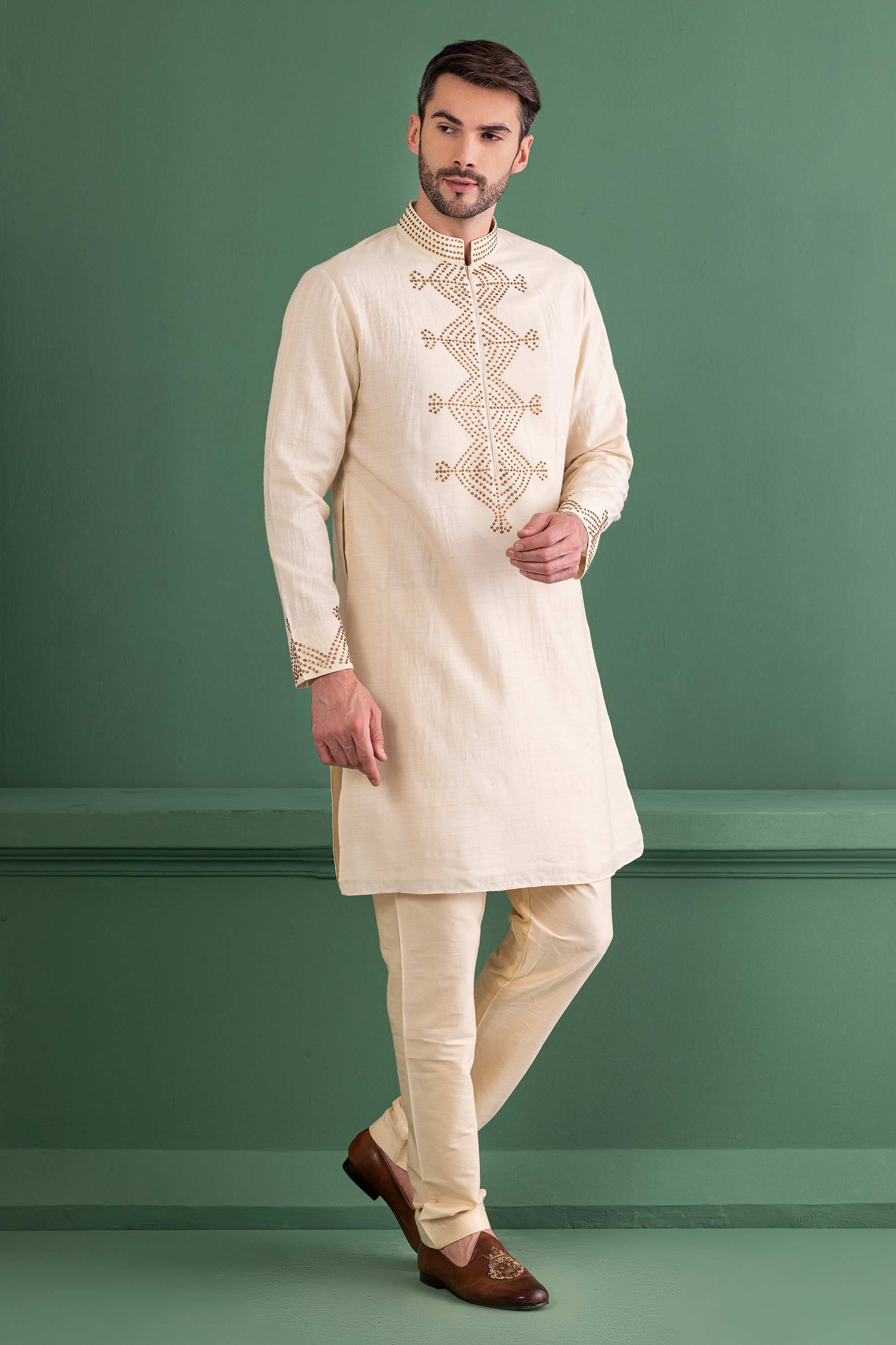 cream kurta with metal work