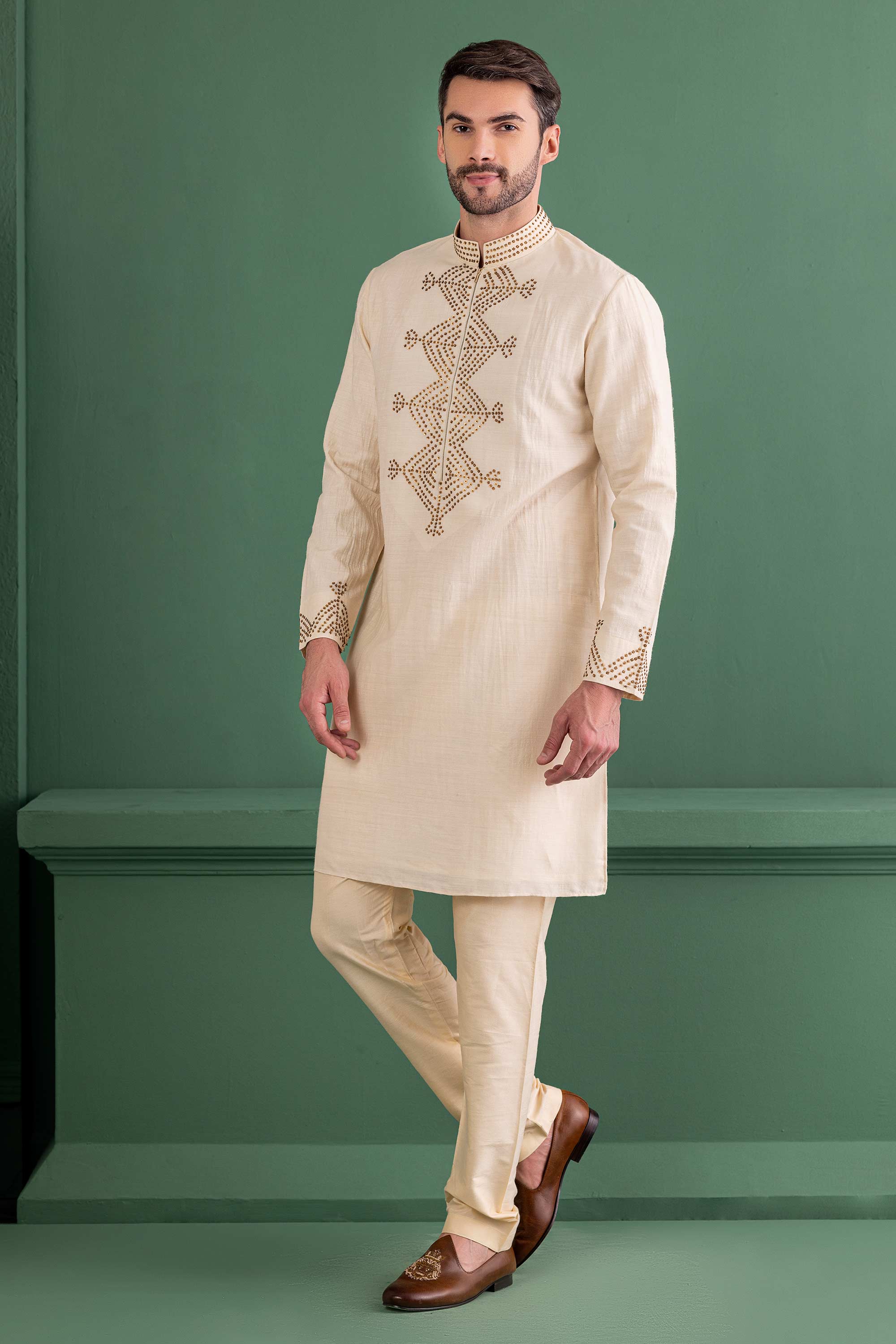 cream kurta with metal work