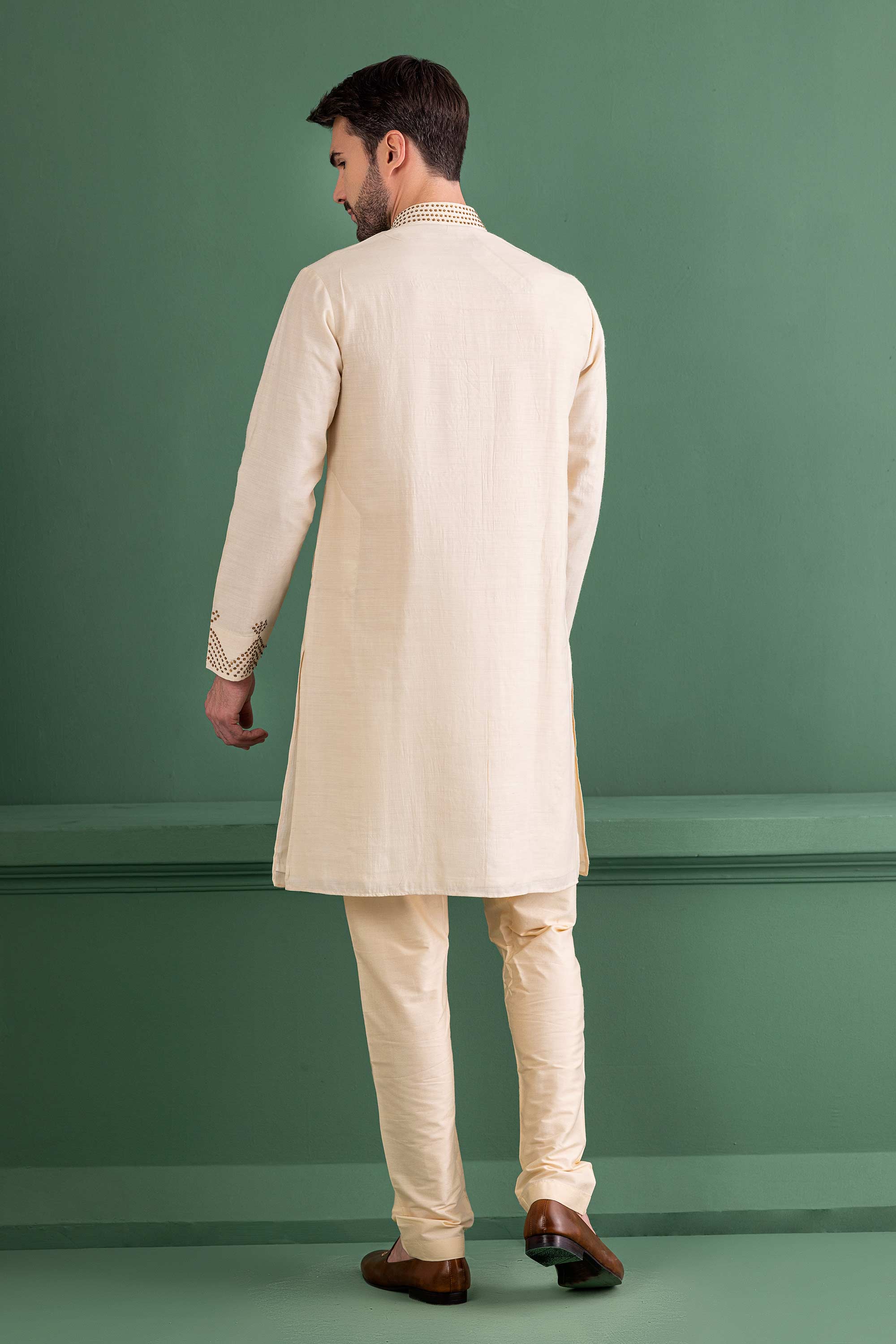 cream kurta with metal work