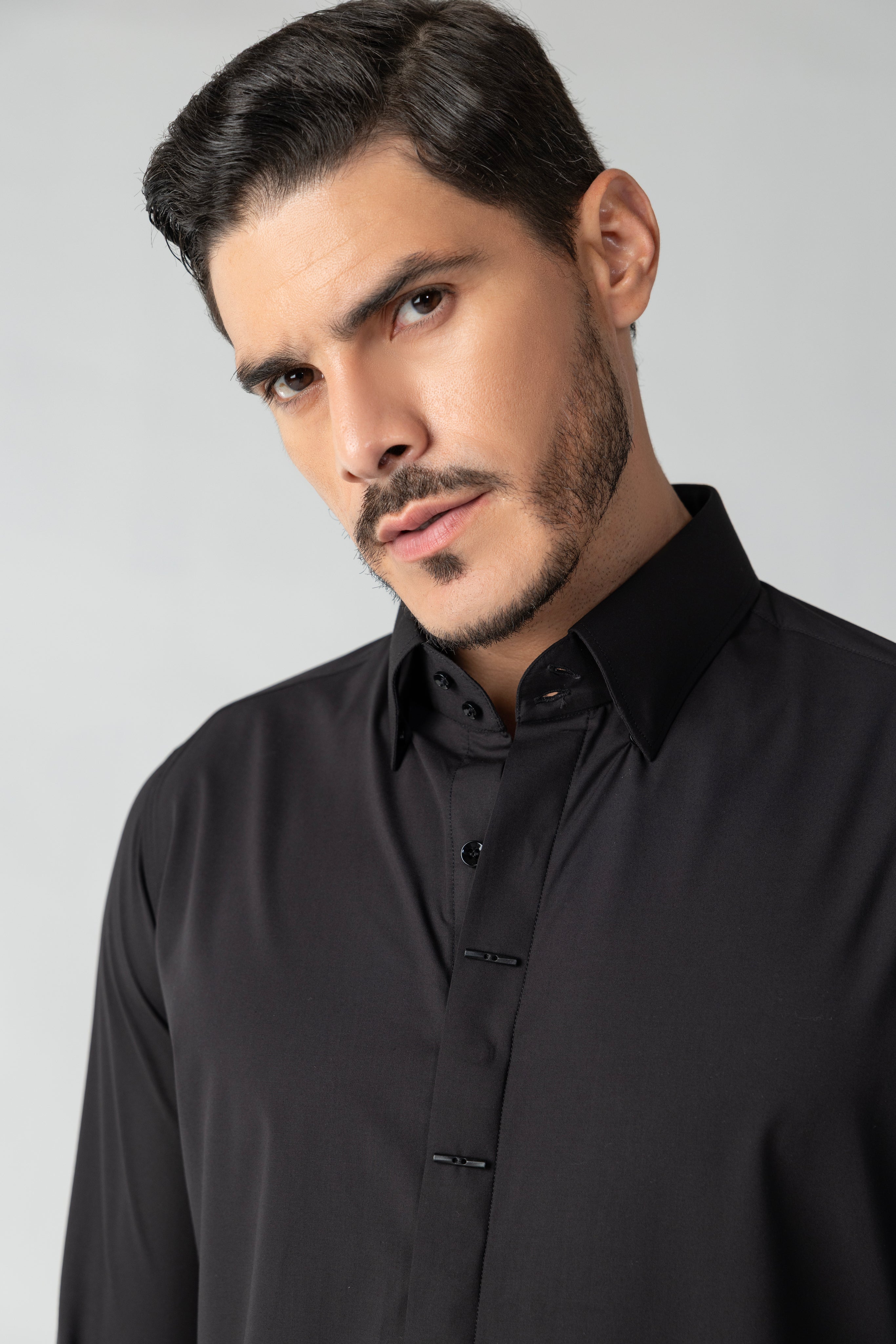 Black shirt with statement metallic buttons