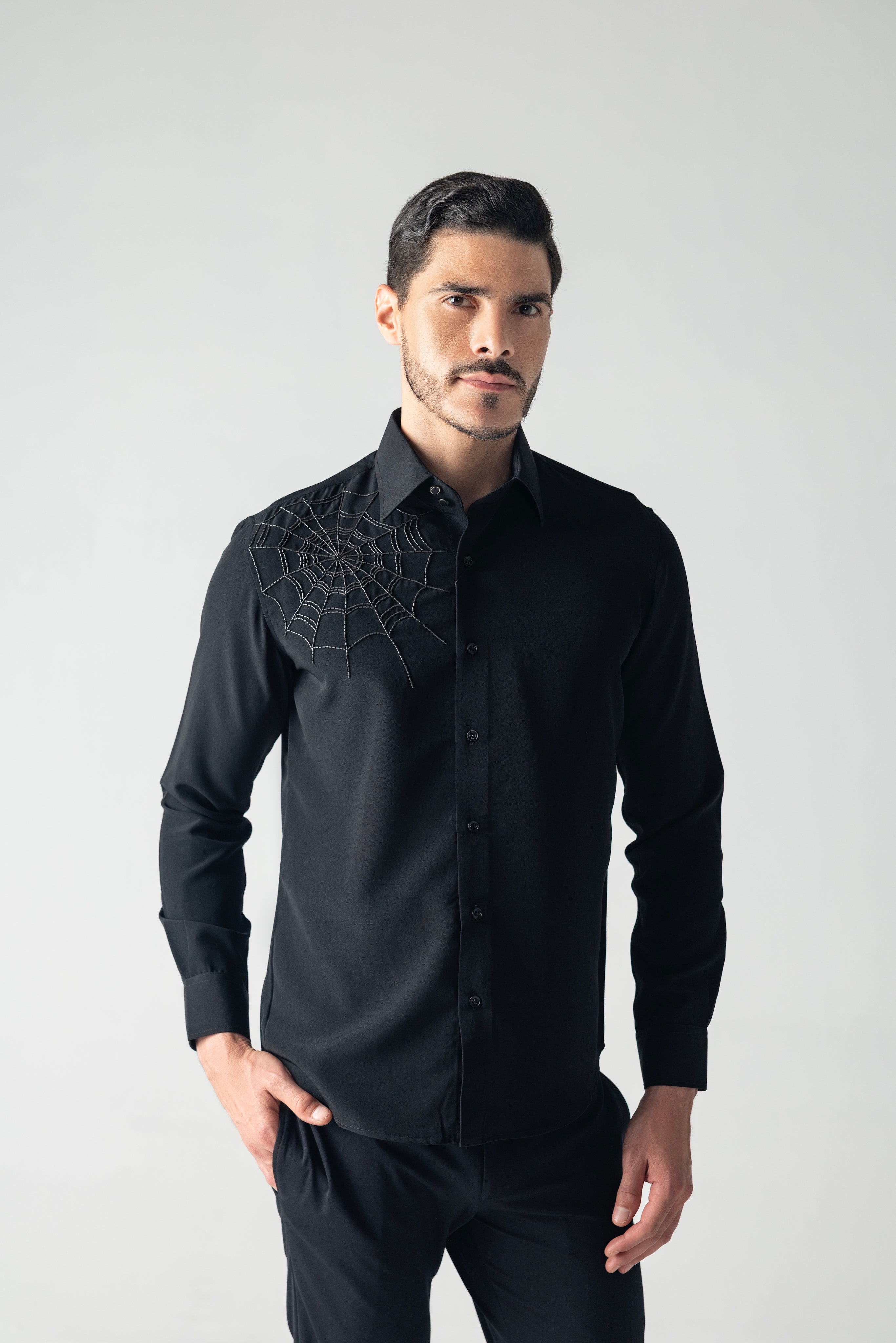 Black shirt with hand-embroidered spider web motif