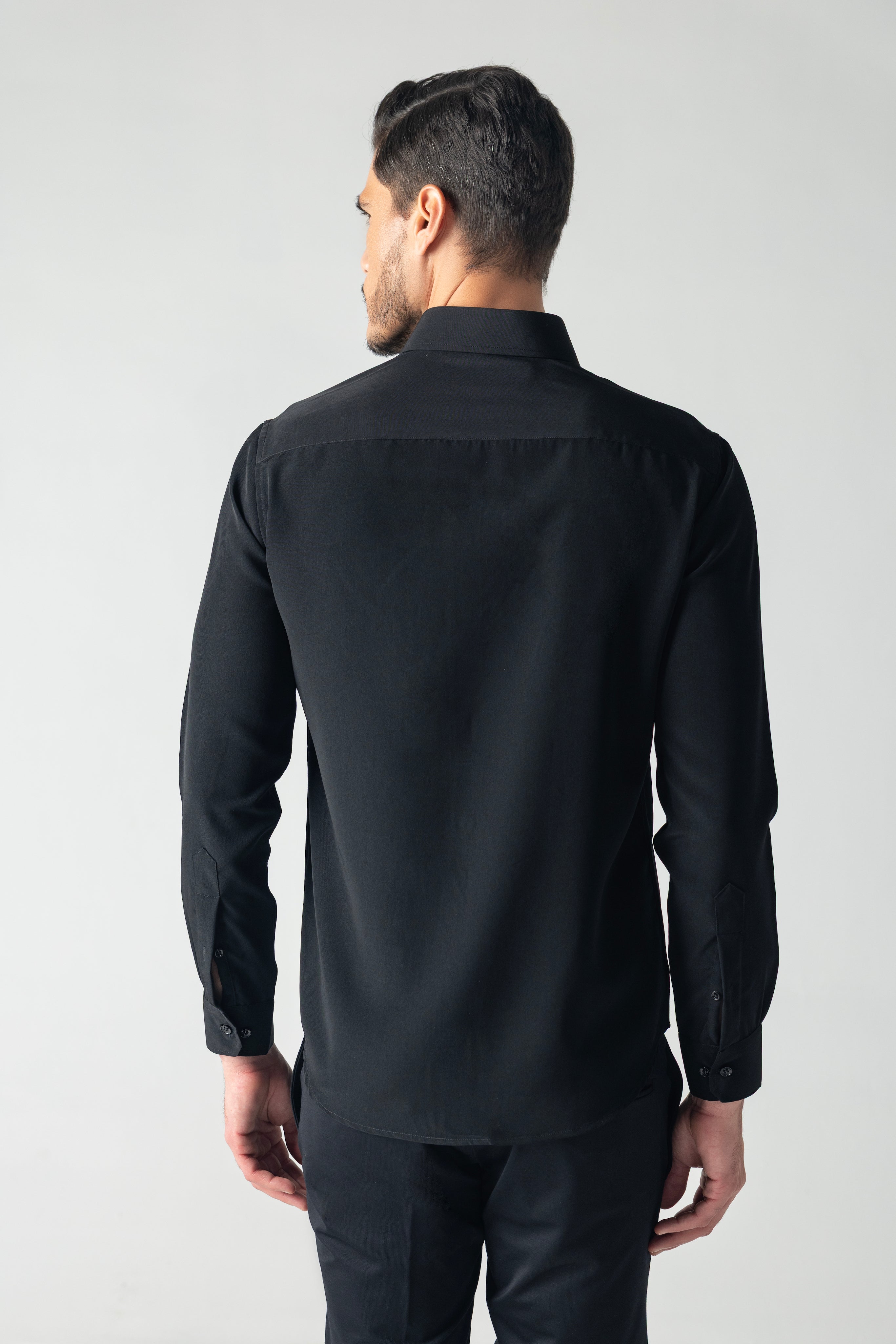 Black shirt with hand-embroidered spider web motif