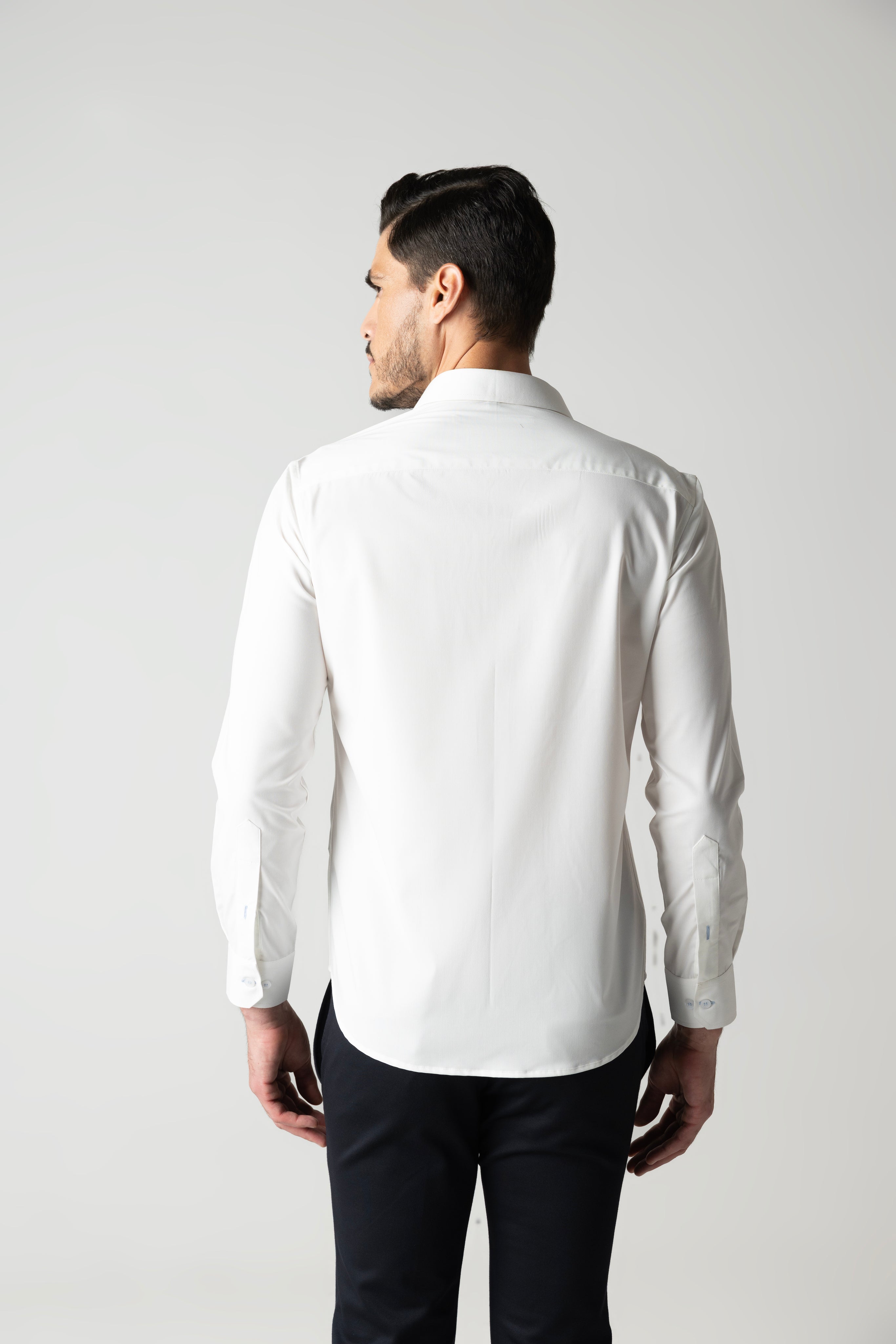 White shirt with embroidered sky blue geometrical motifs