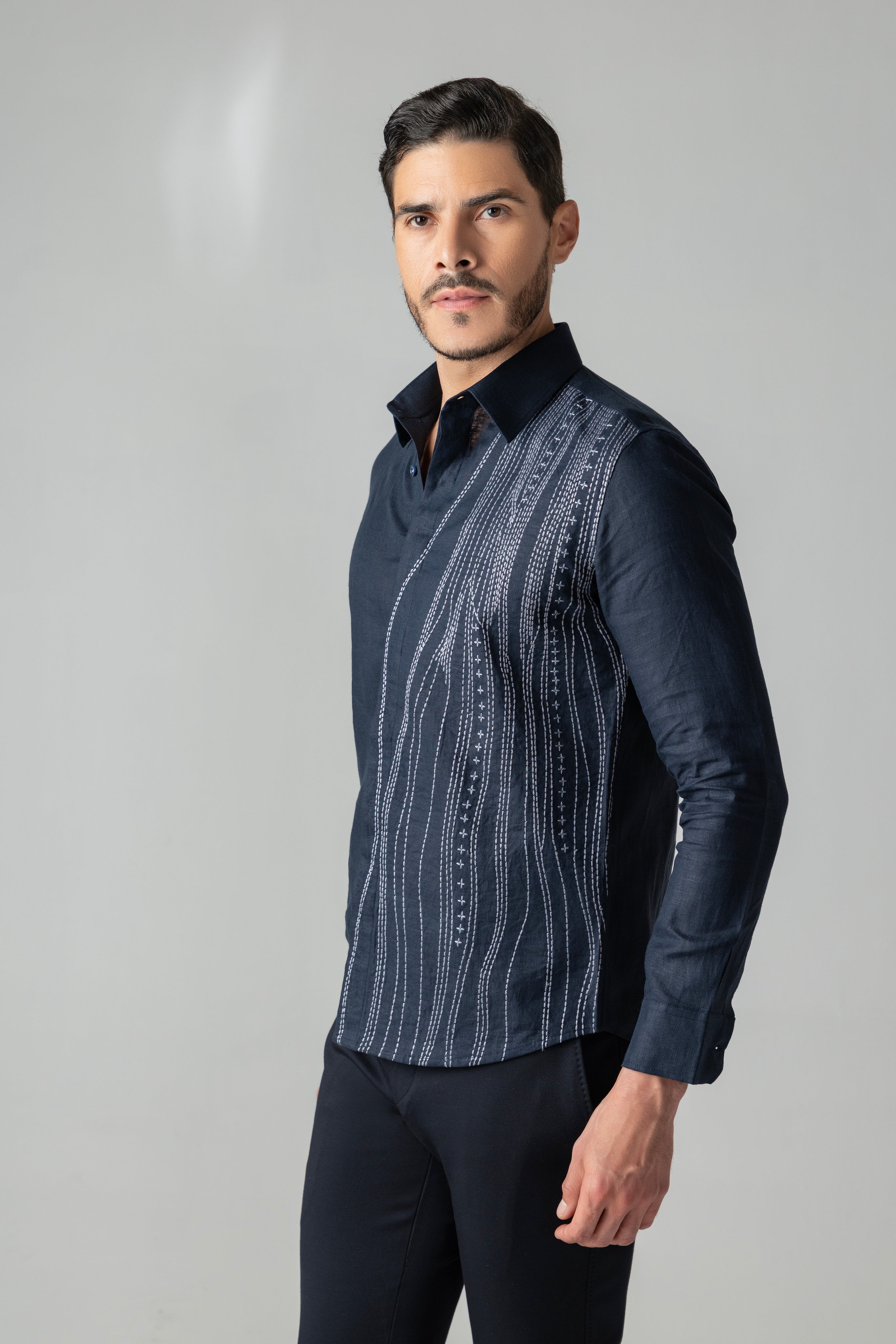 Navy blue linen shirt with wave-inspired contrast embroidery