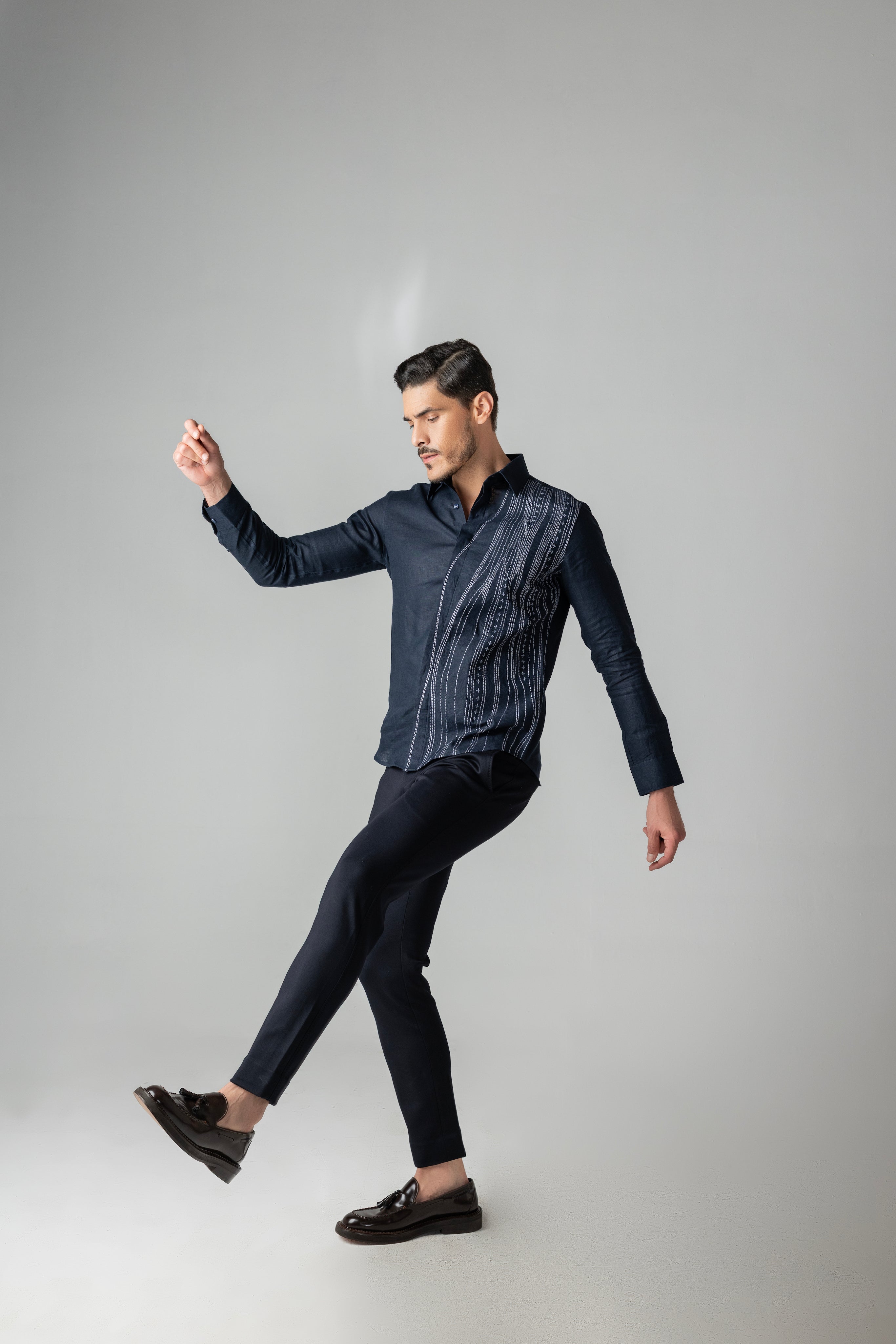 Navy blue linen shirt with wave-inspired contrast embroidery