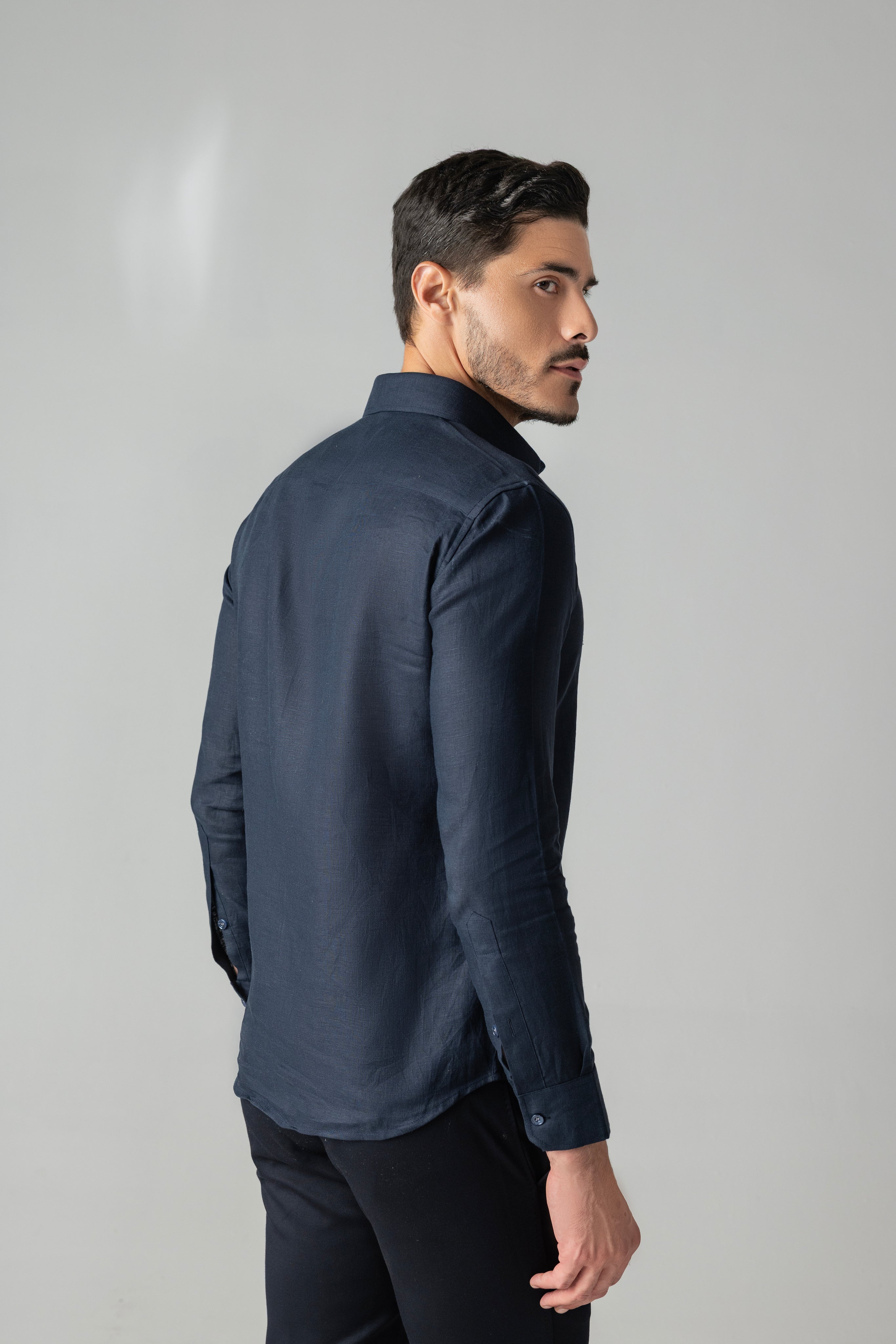 Navy blue linen shirt with wave-inspired contrast embroidery