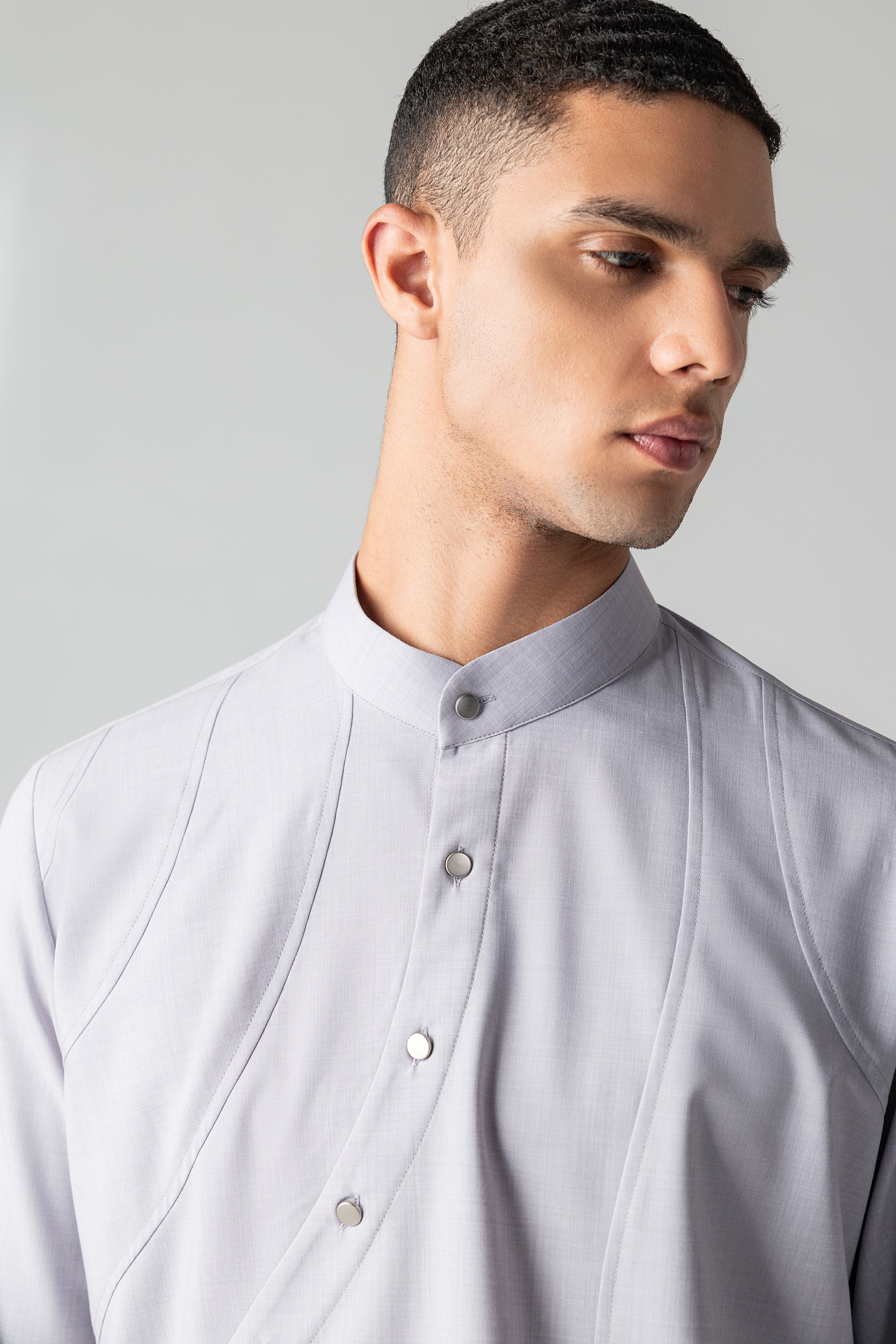 Grey shirt with asymmetrical buttons & yoke detailing