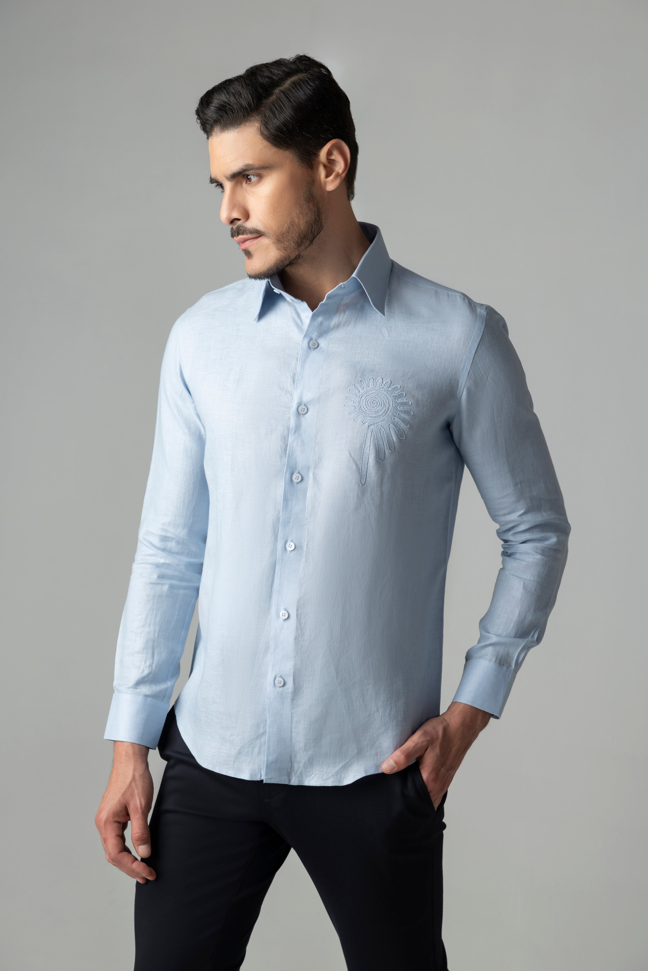 Sky blue linen shirt with embroidered floral motif