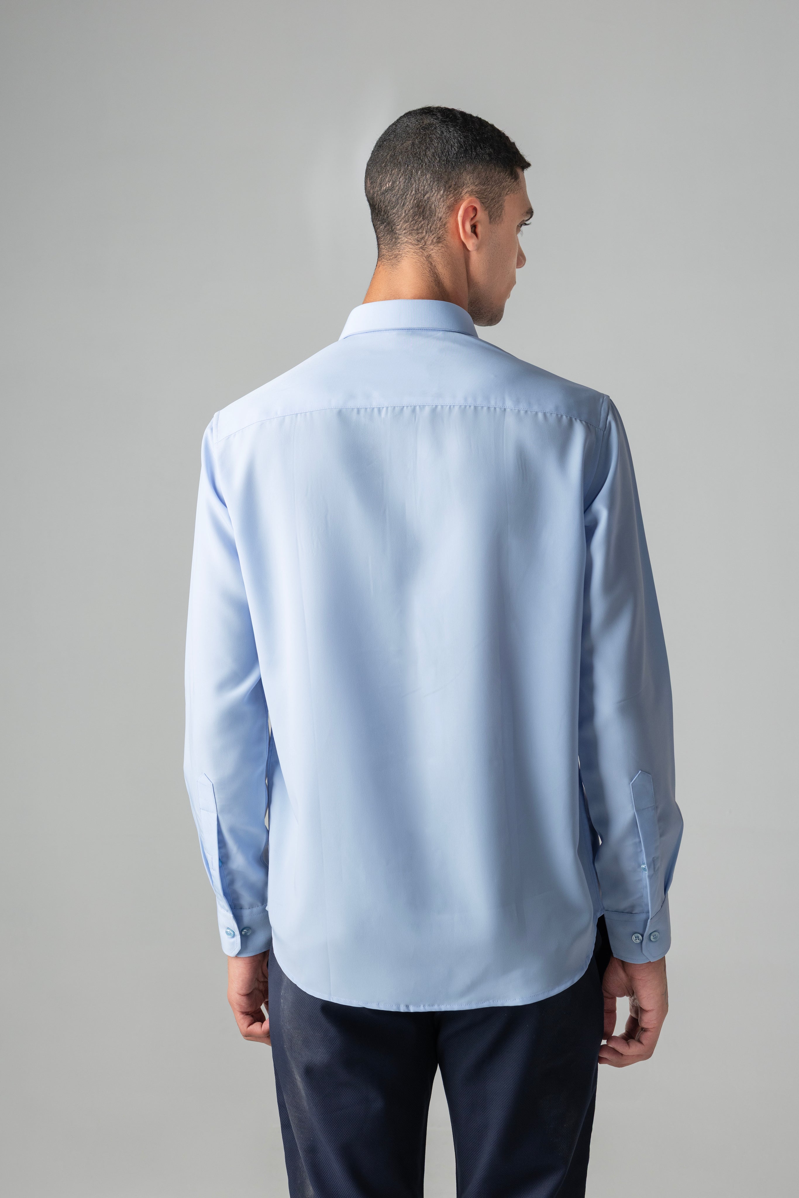 Sky blue shirt with metallic hand-embroidered Reindeer motif