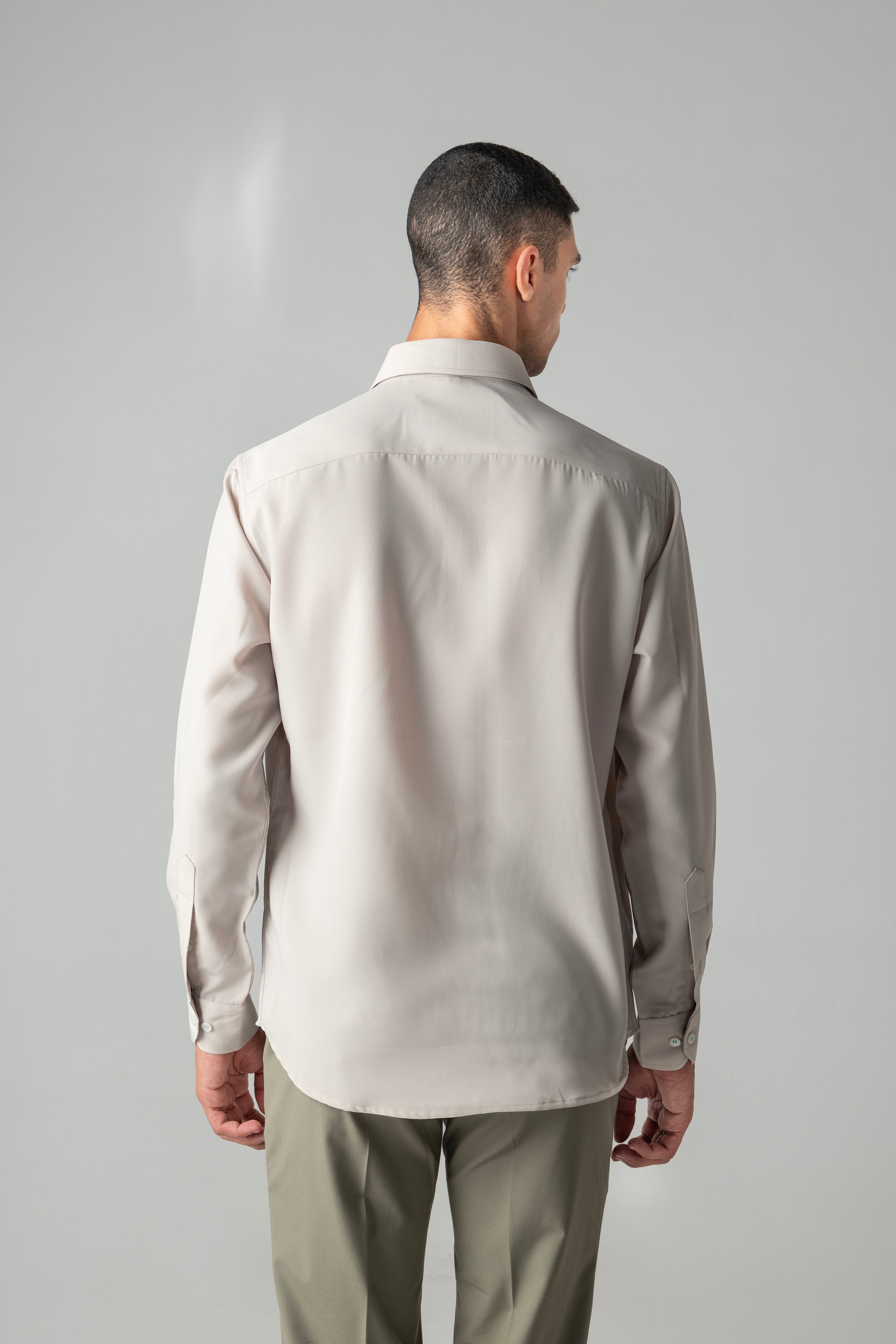 Beige shirt with abstract multi-coloured, geometrical embroidery