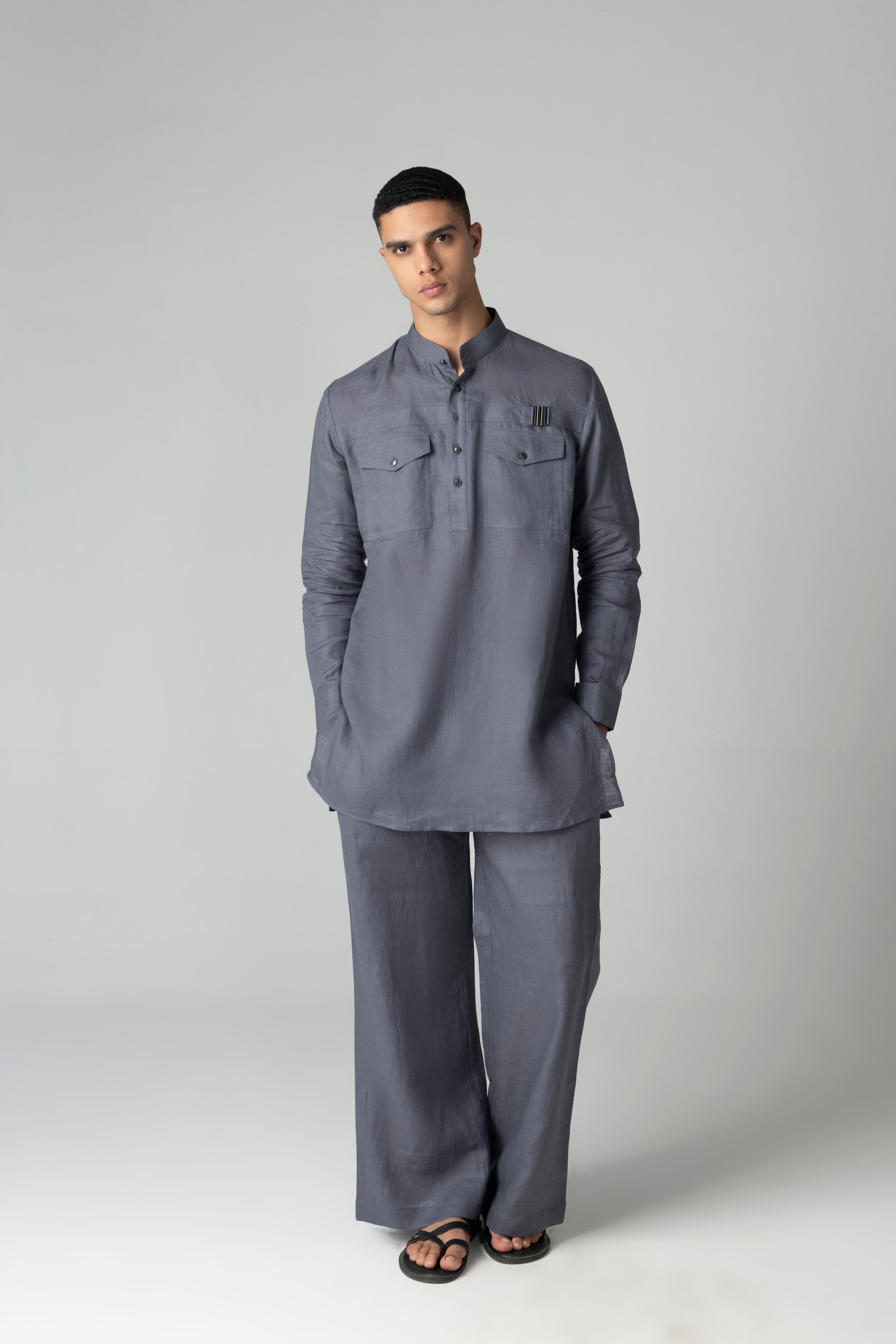 Grey short linen kurta with patch pocket & buckle detailing, paired with a matching plazzo