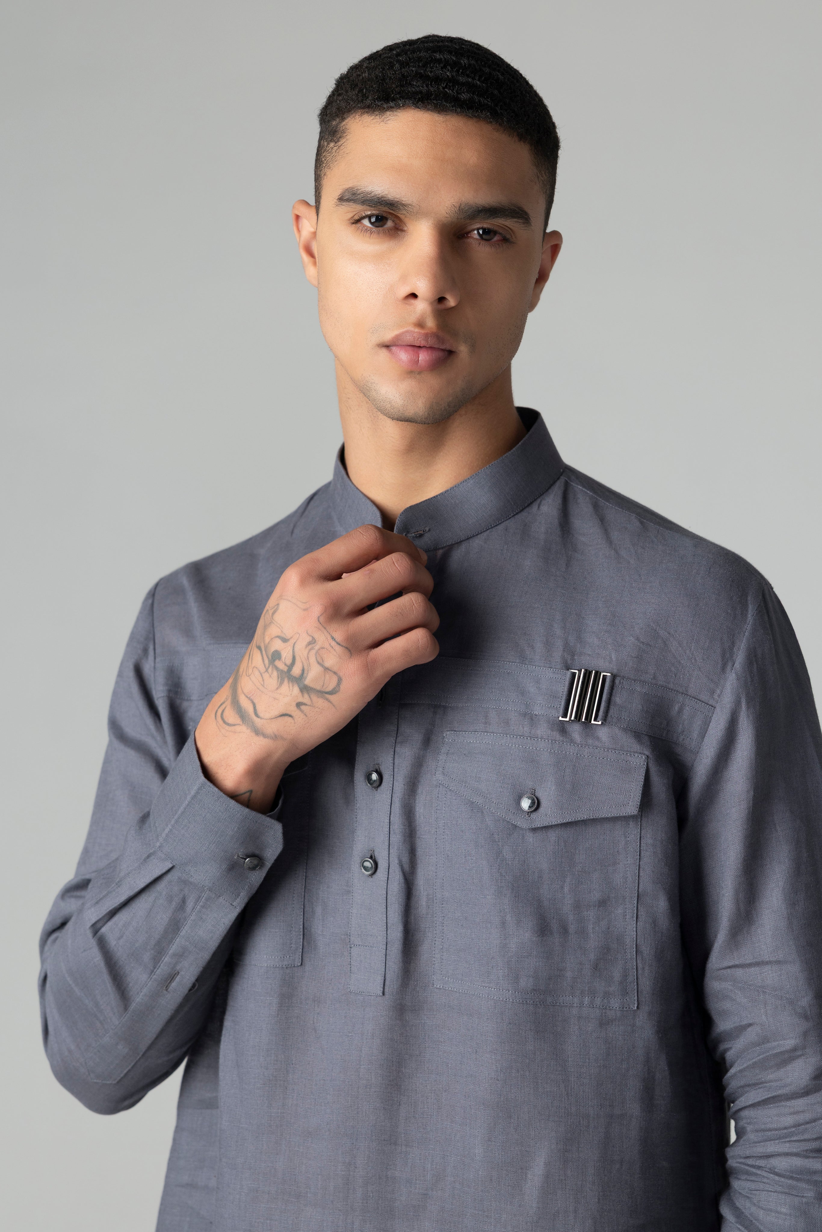 Grey short linen kurta with patch pocket & buckle detailing, paired with a matching plazzo