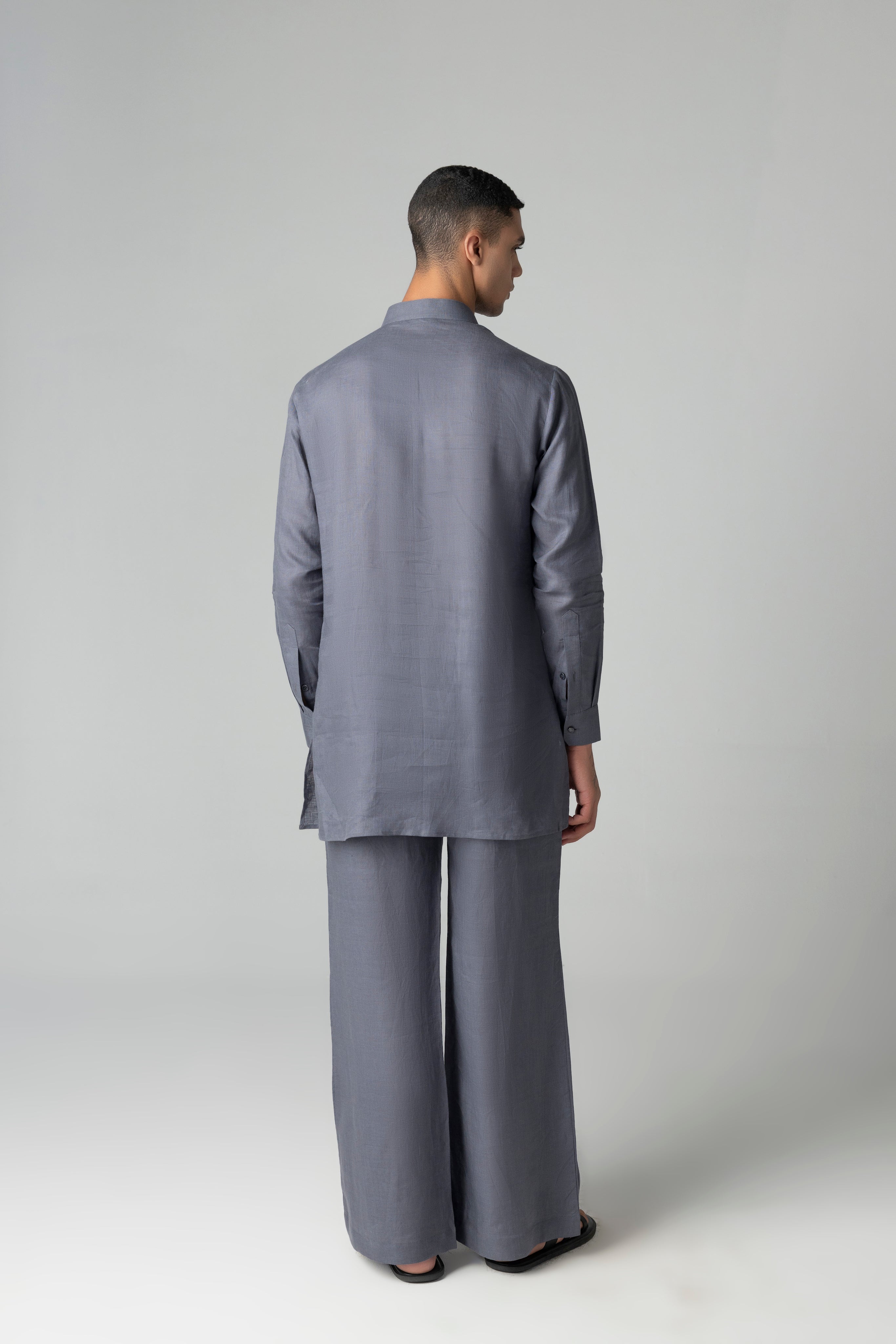 Grey short linen kurta with patch pocket & buckle detailing, paired with a matching plazzo