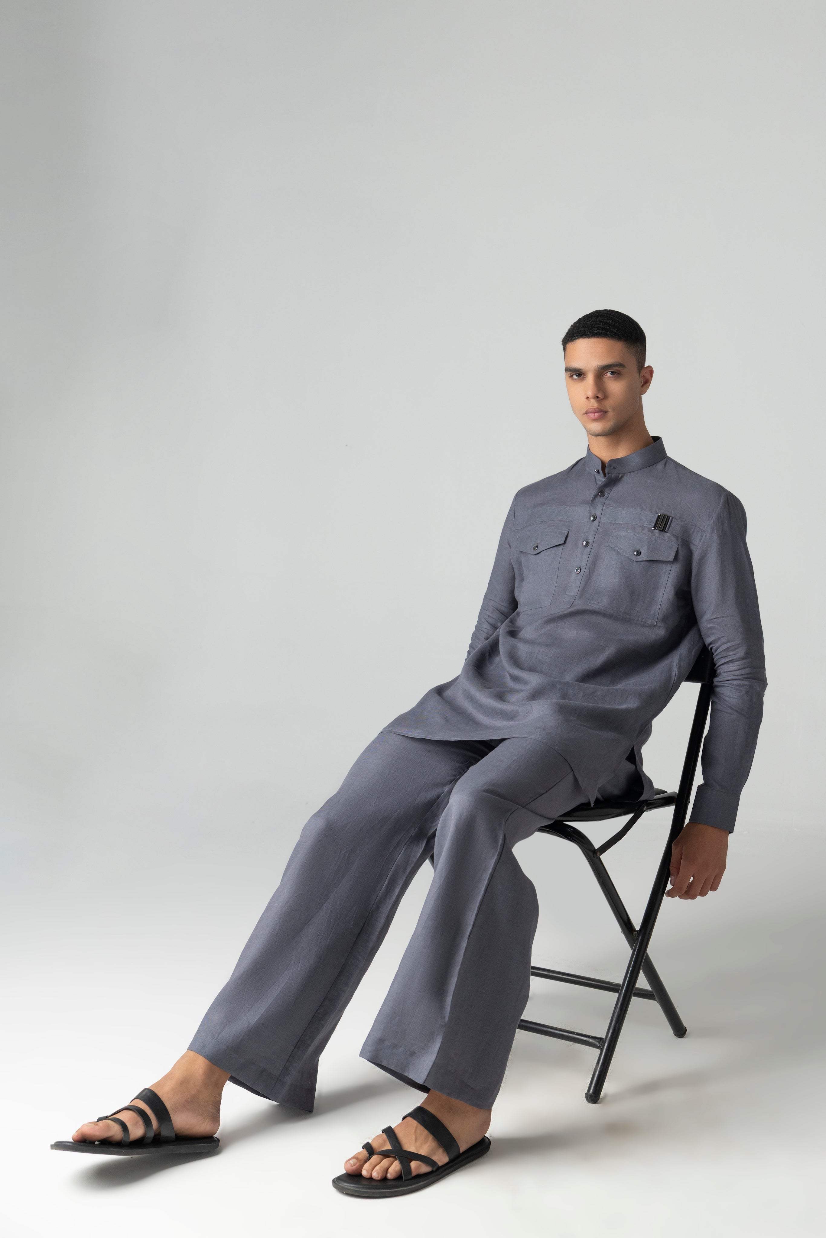 Grey short linen kurta with patch pocket & buckle detailing, paired with a matching plazzo