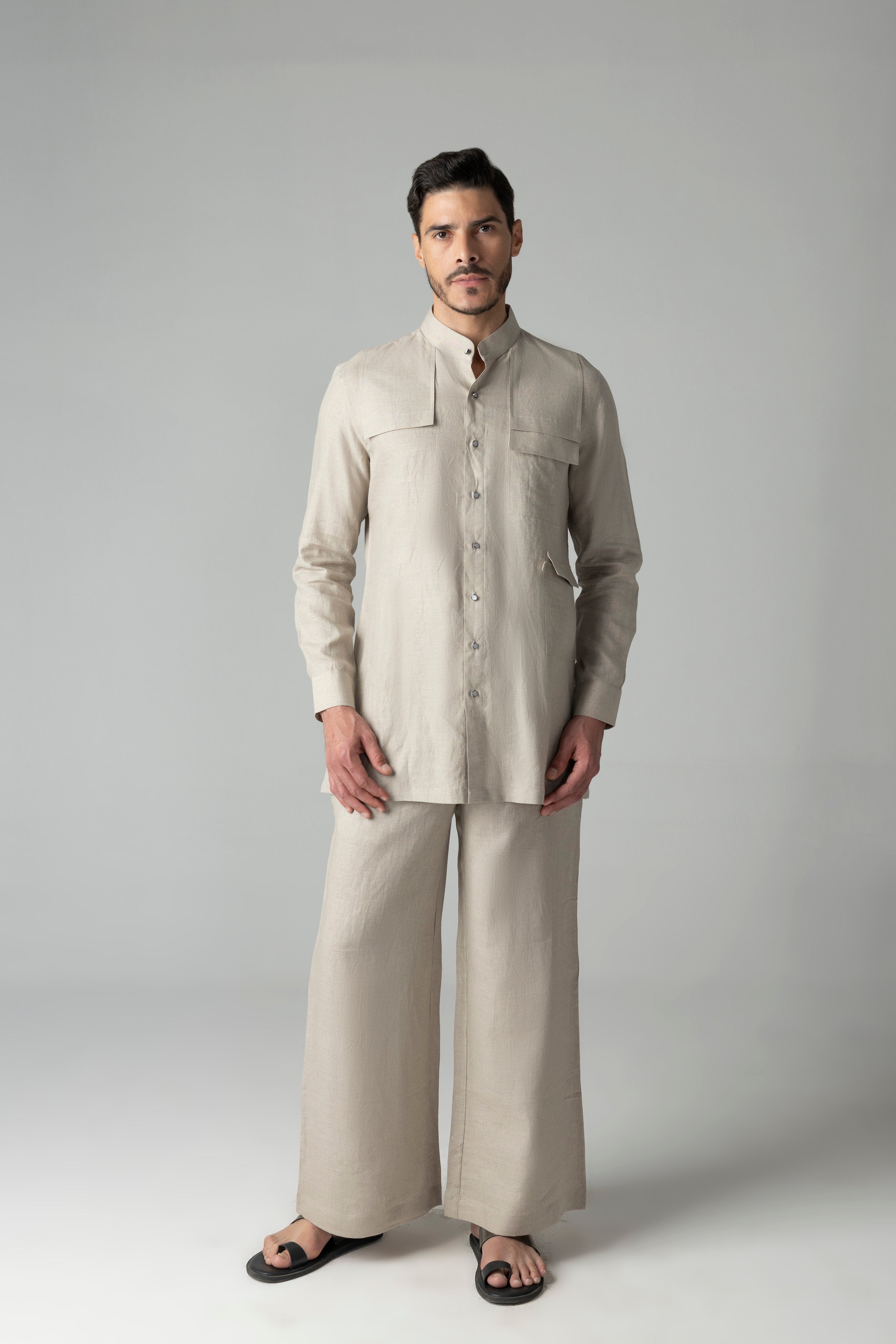Beige linen short kurta with patch pocket detailing, paired with a matching plazzo
