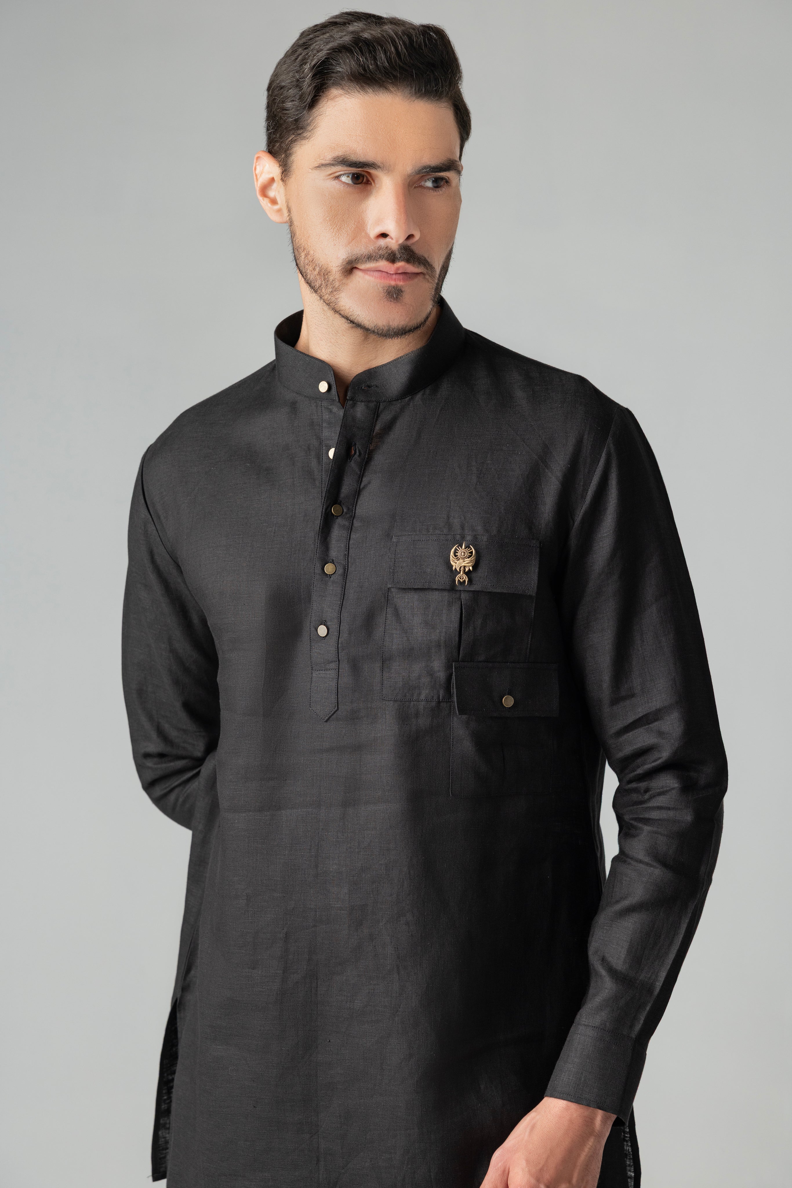 Black short linen kurta with patch pocket & brooch detailing, paired with a matching plazzo