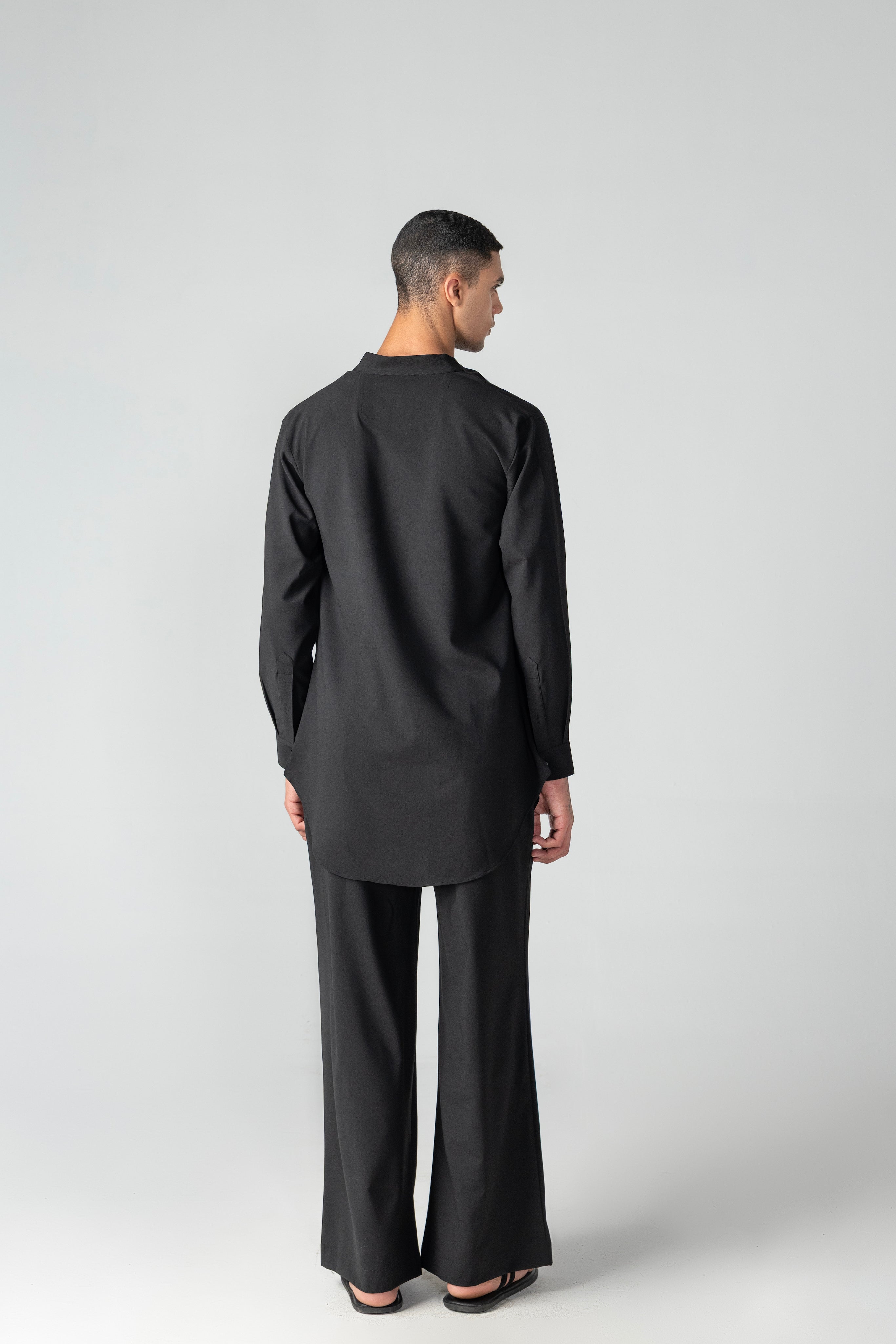 Black short crepe, cowl-neck kurta with thread embroidery detailing, paired with a matching plazzo