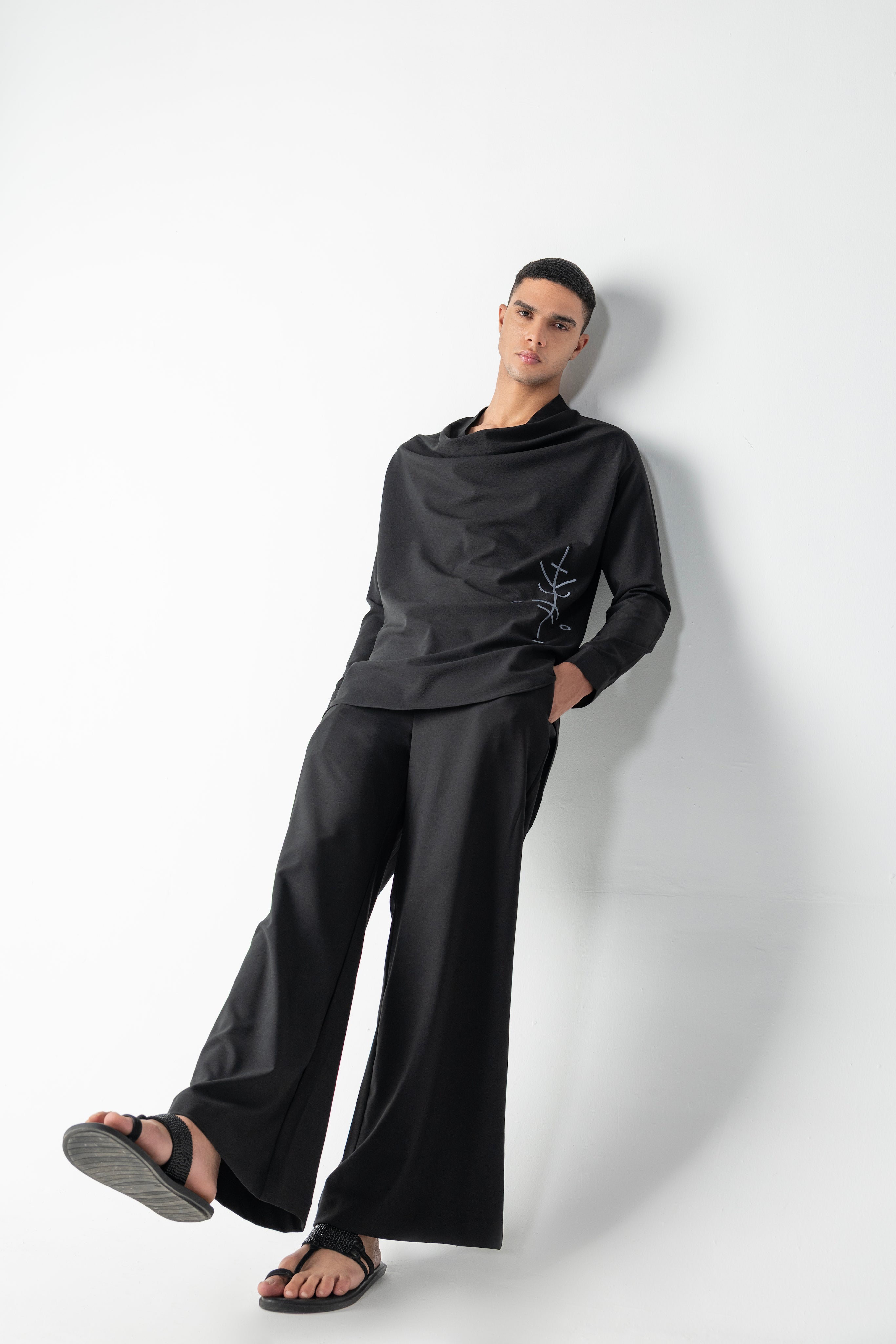 Black short crepe, cowl-neck kurta with thread embroidery detailing, paired with a matching plazzo
