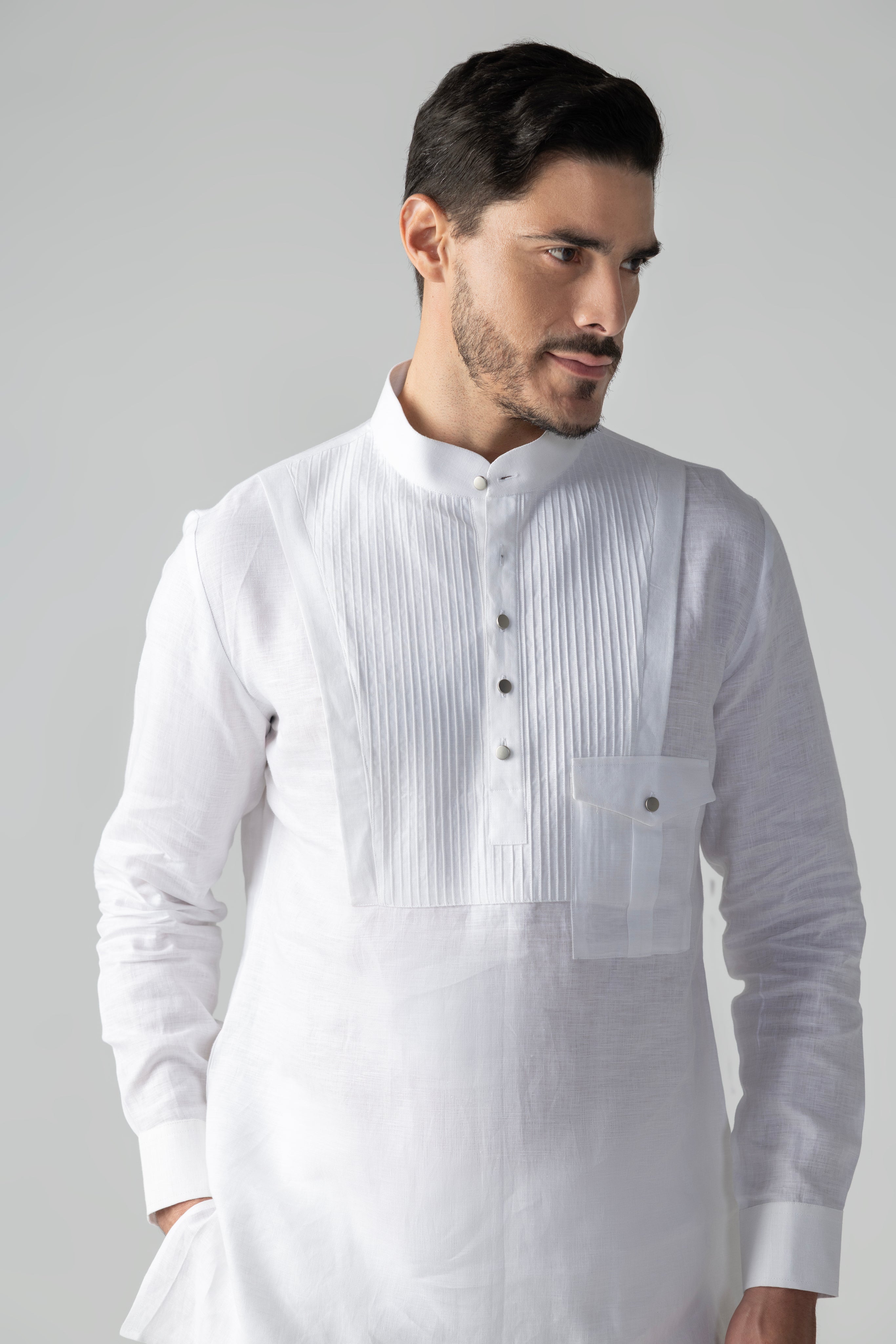 White short linen kurta with patch pocket & pintucks detailing, paired with a matching plazzo