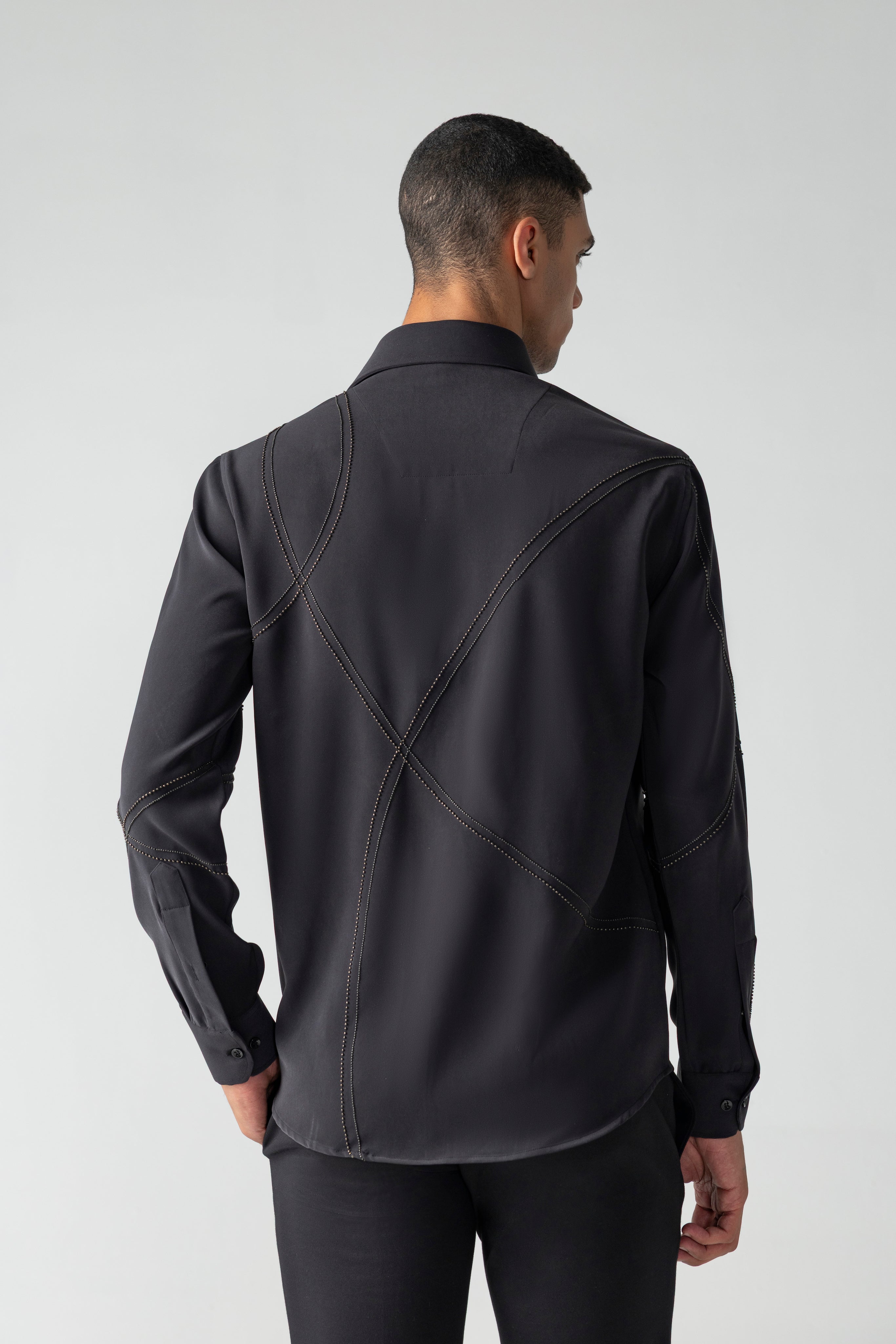 Black shirt with all-over abstract metallic hand-embroidery – Amit