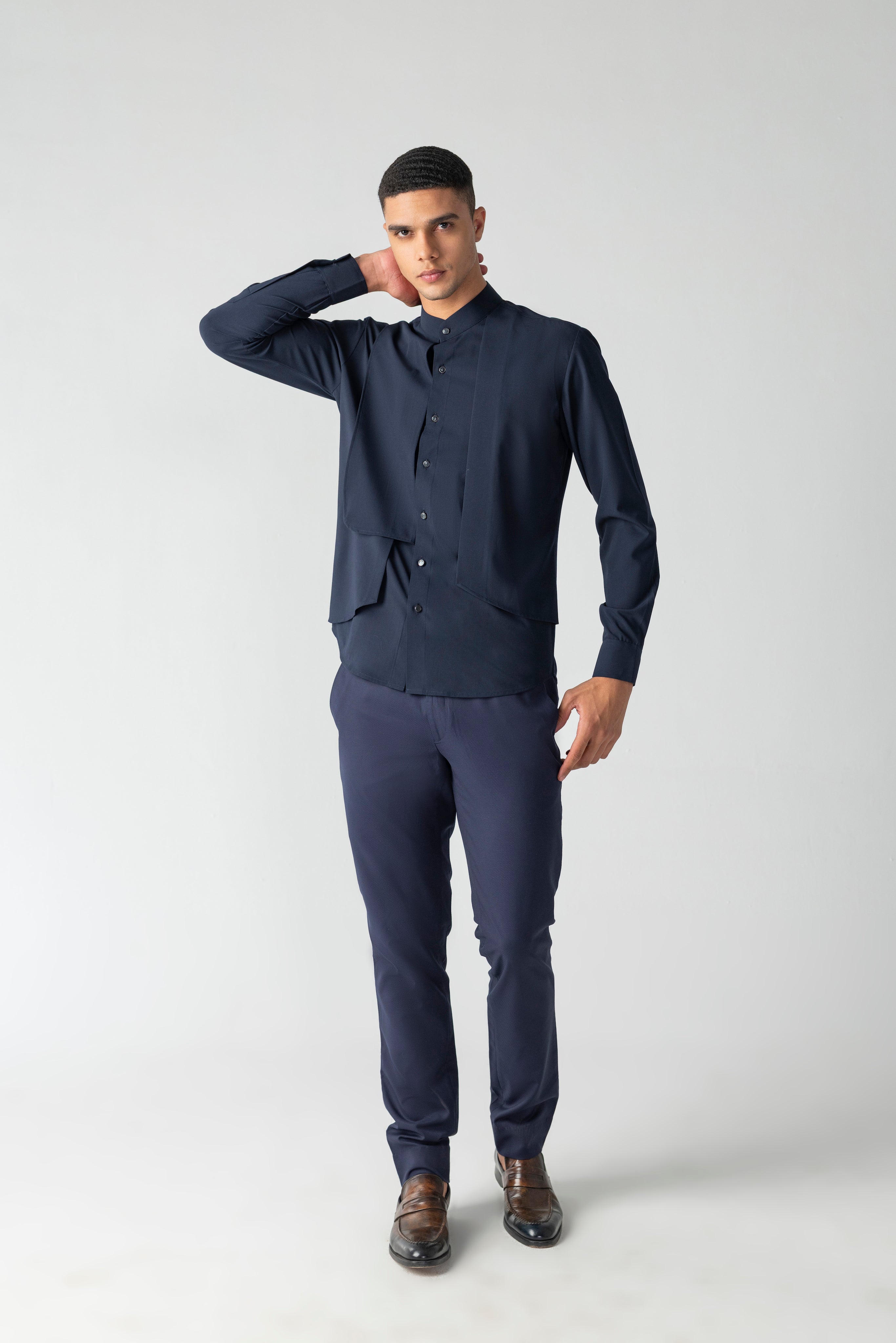 Navy blue shirt with asymmetrical cuts & drapes