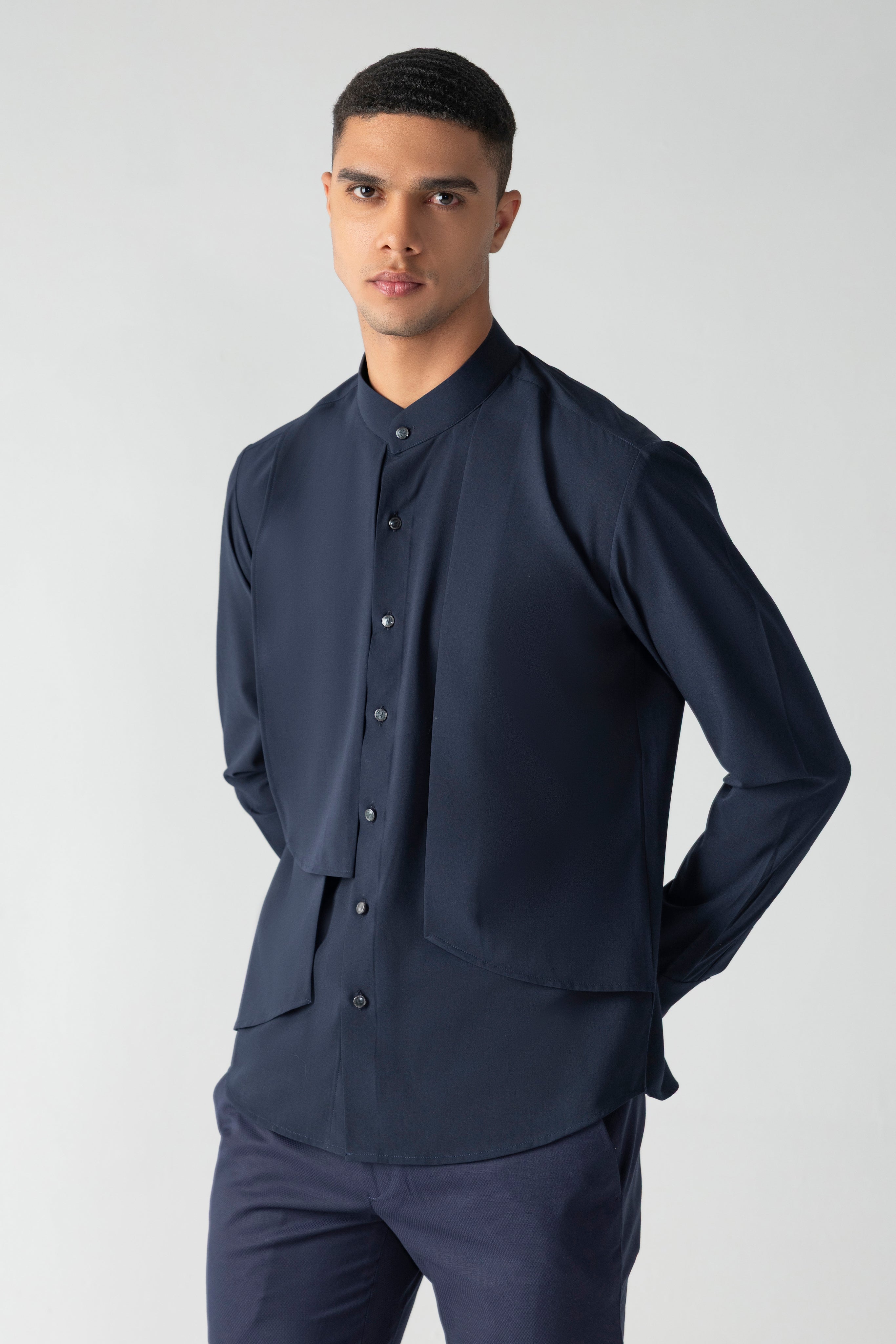 Navy blue shirt with asymmetrical cuts & drapes