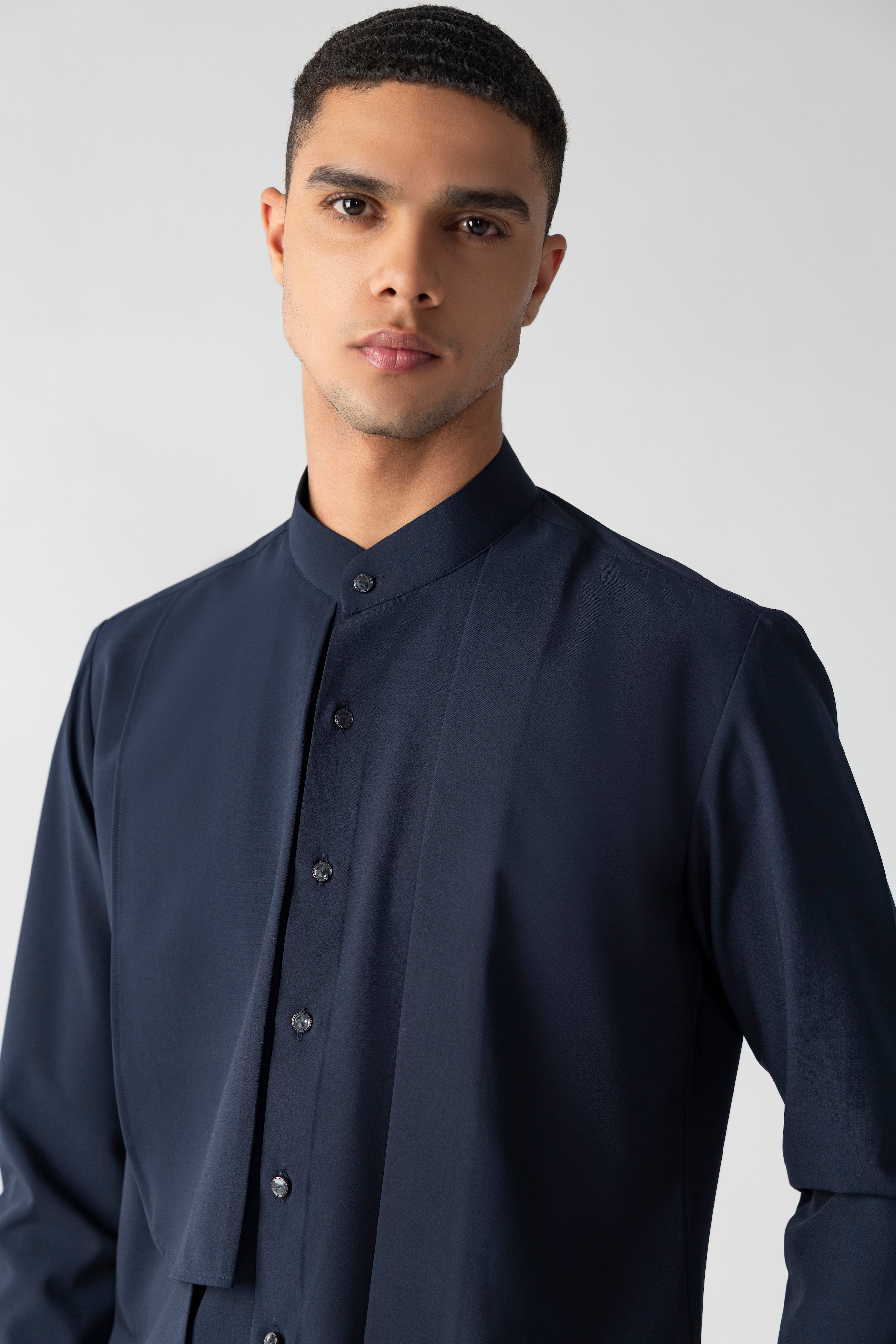 Navy blue shirt with asymmetrical cuts & drapes