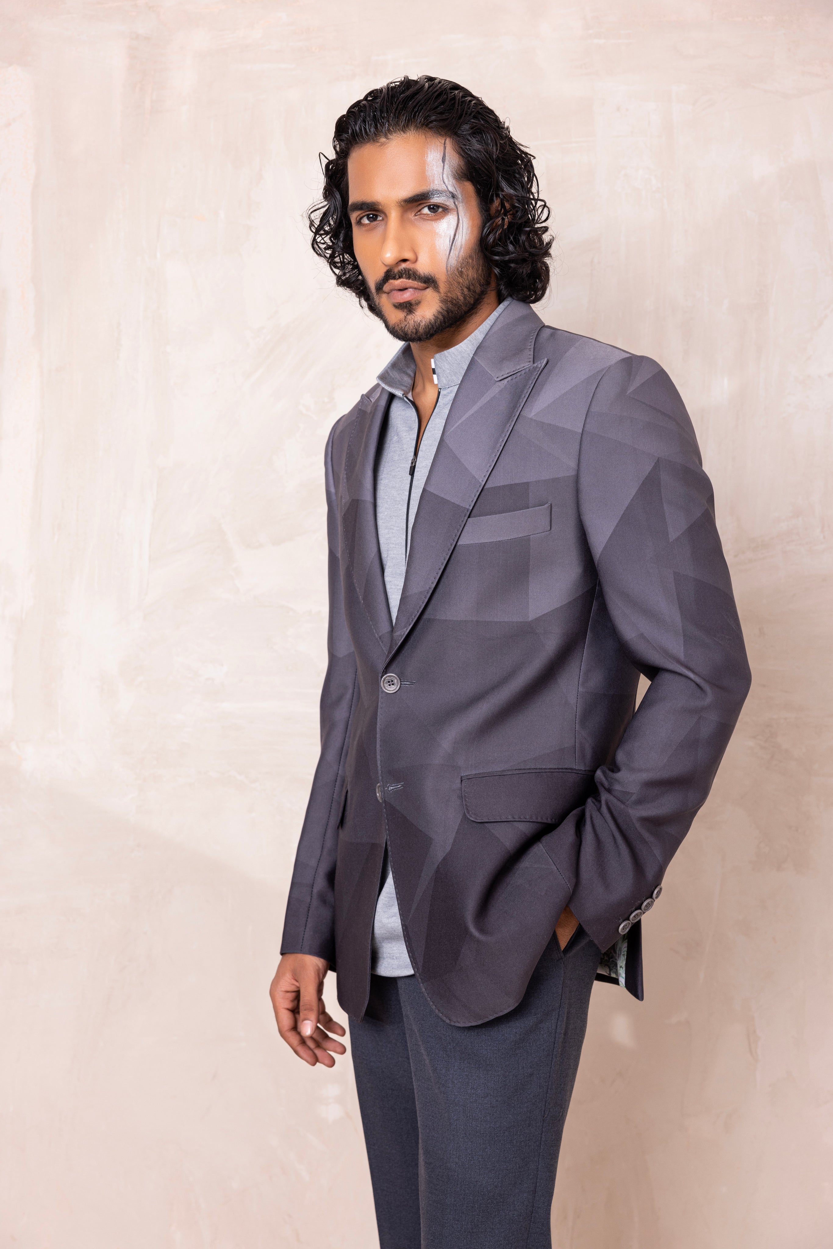 Digital print blazer with abstract design.