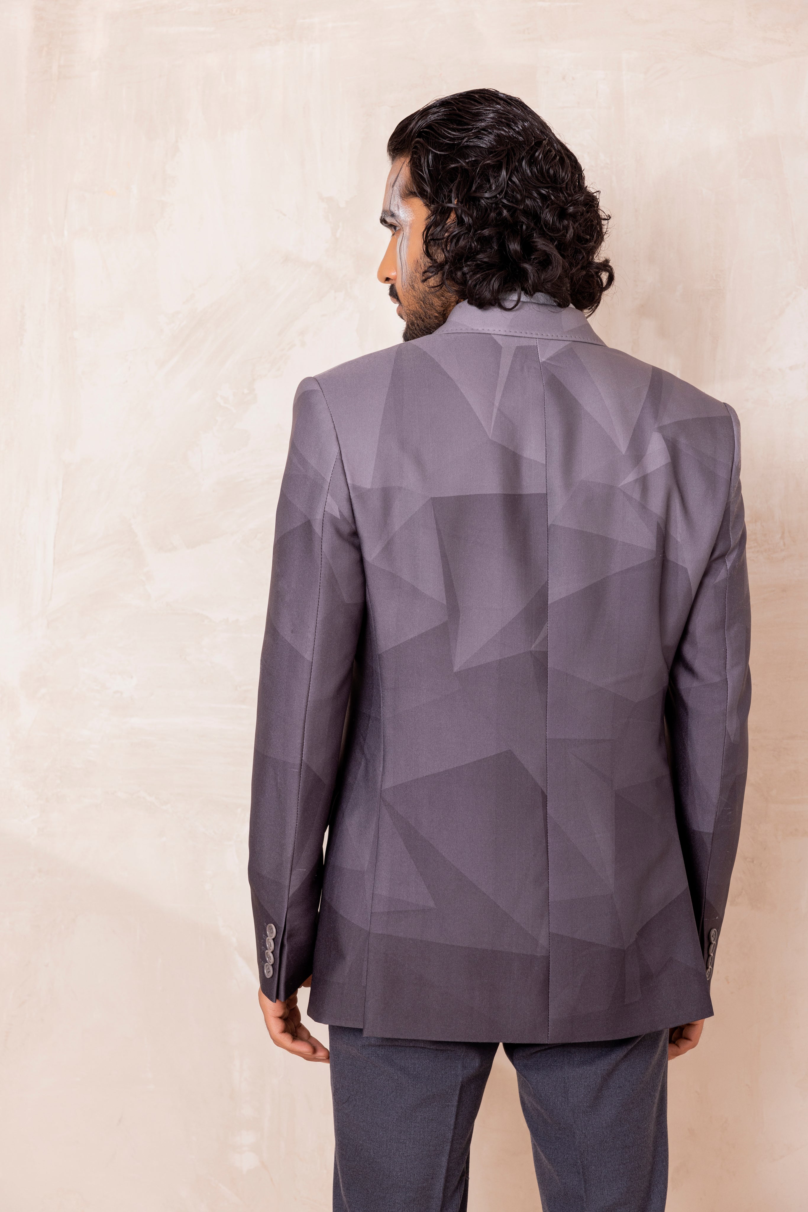 Digital print blazer with abstract design.