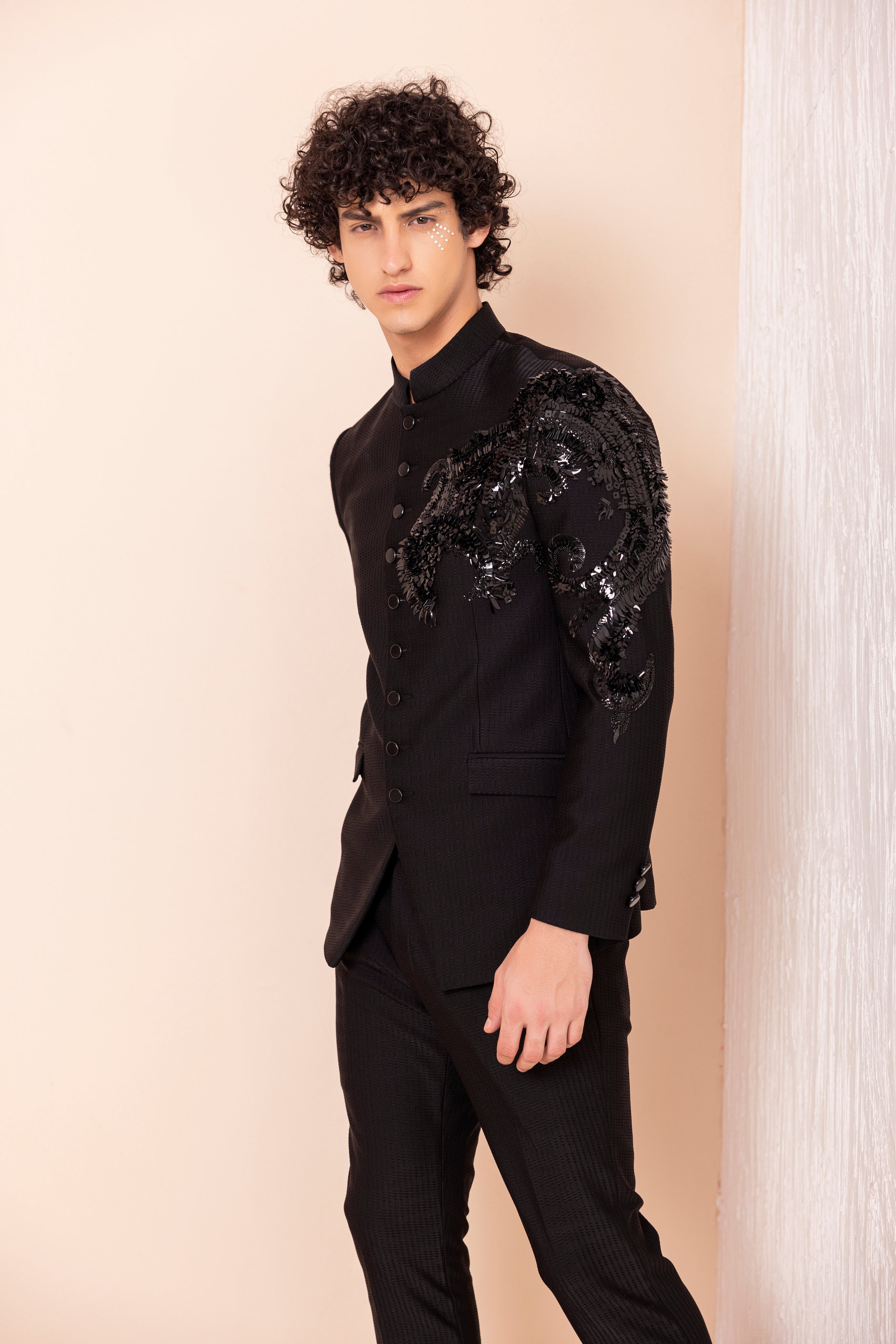 Hand embroidered Dragon motif jodhpuri paired with matching pants.