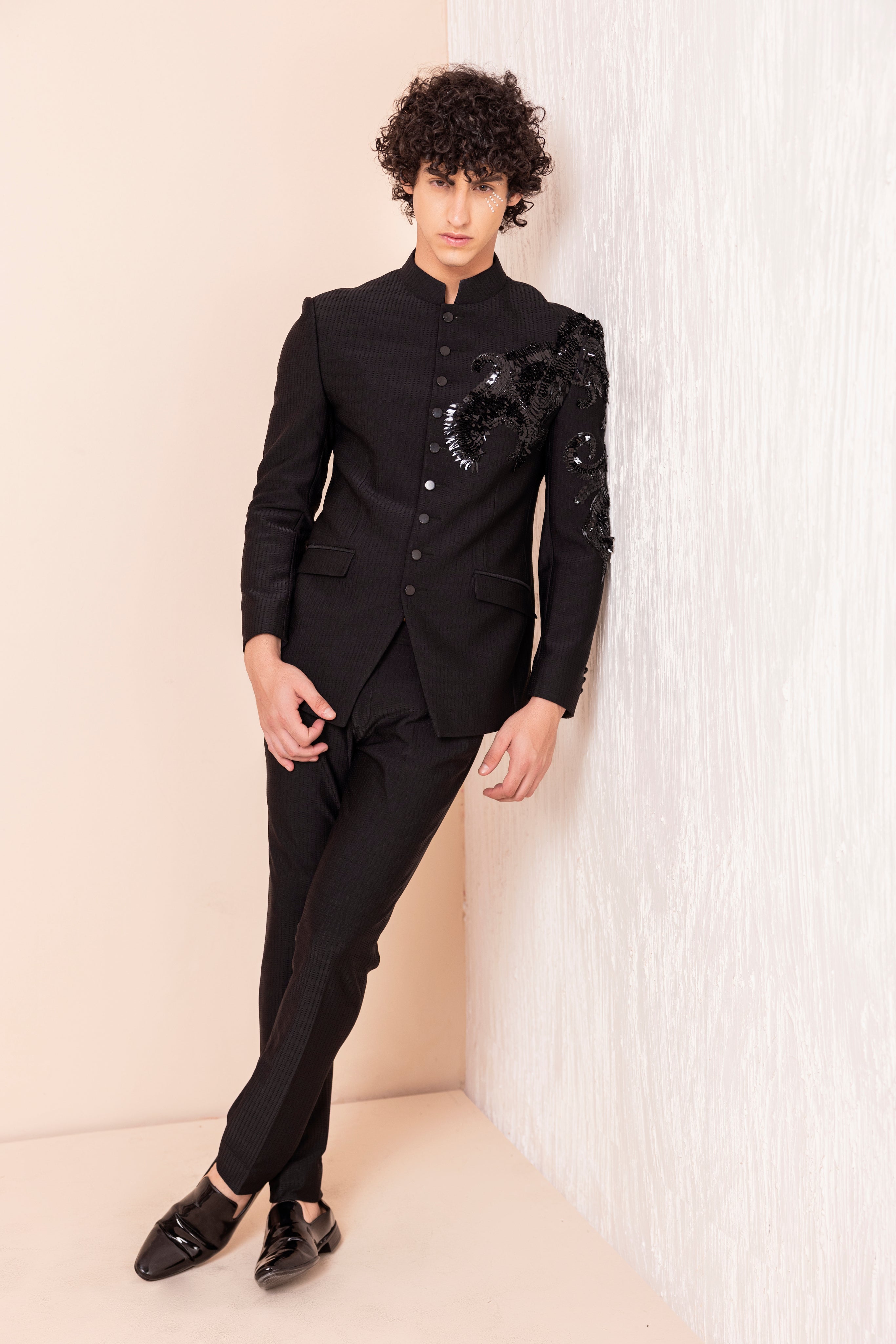 Hand embroidered Dragon motif jodhpuri paired with matching pants.