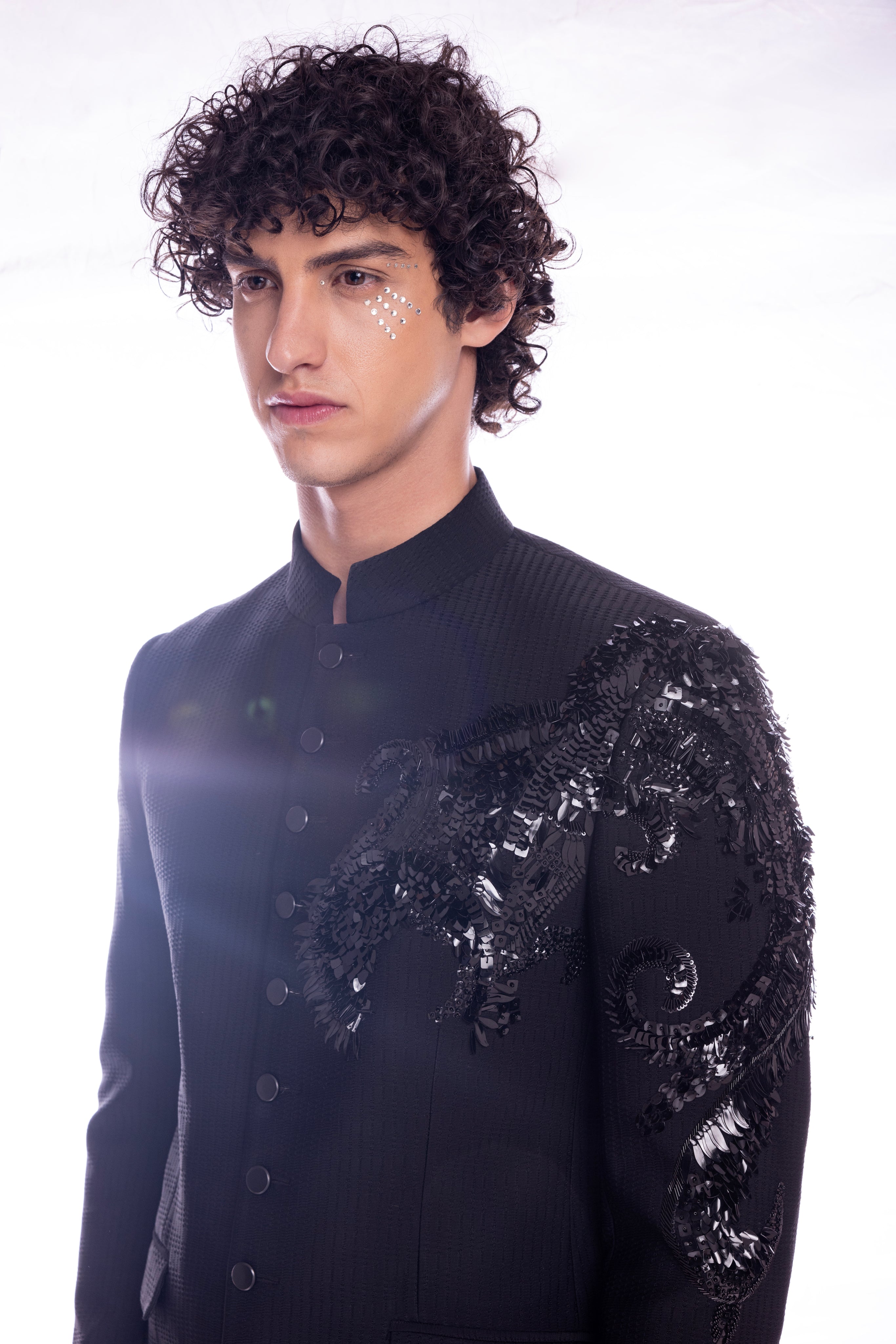 Hand embroidered Dragon motif jodhpuri paired with matching pants.