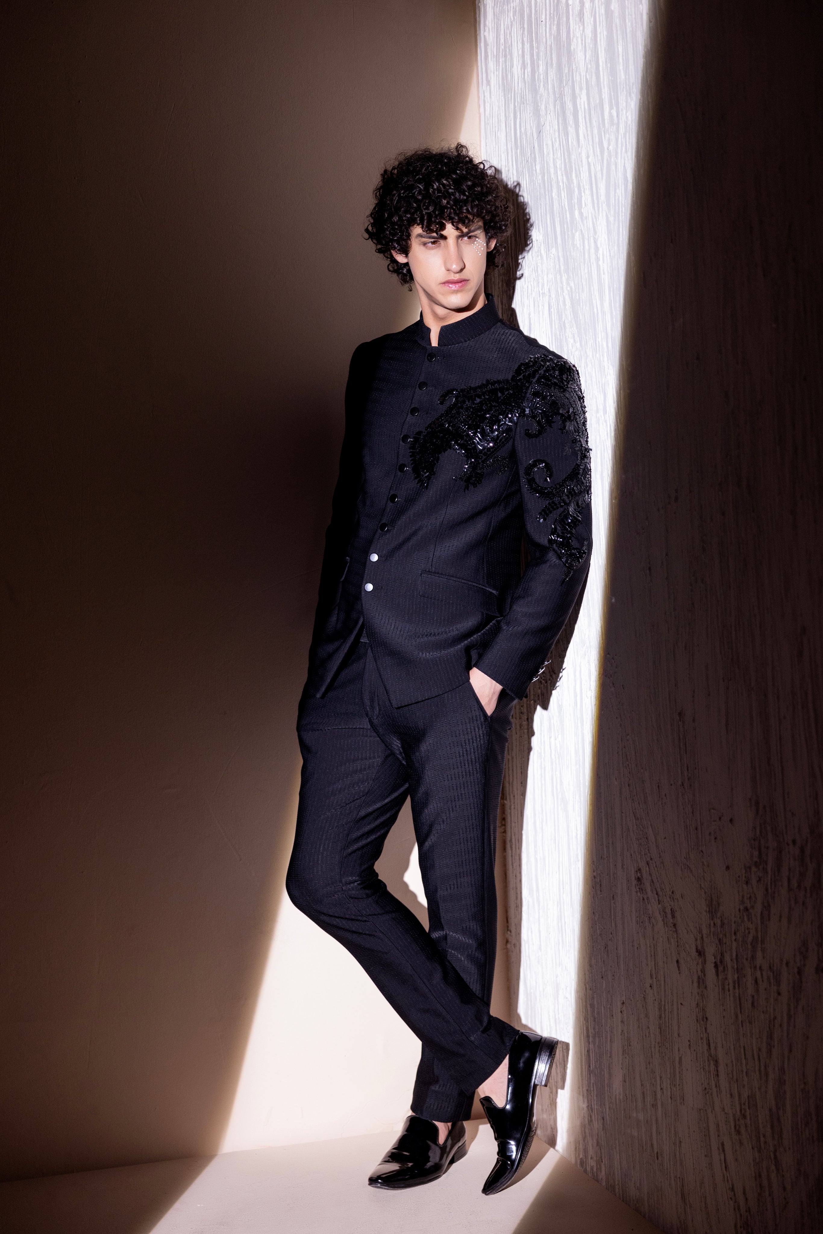 Hand embroidered Dragon motif jodhpuri paired with matching pants.