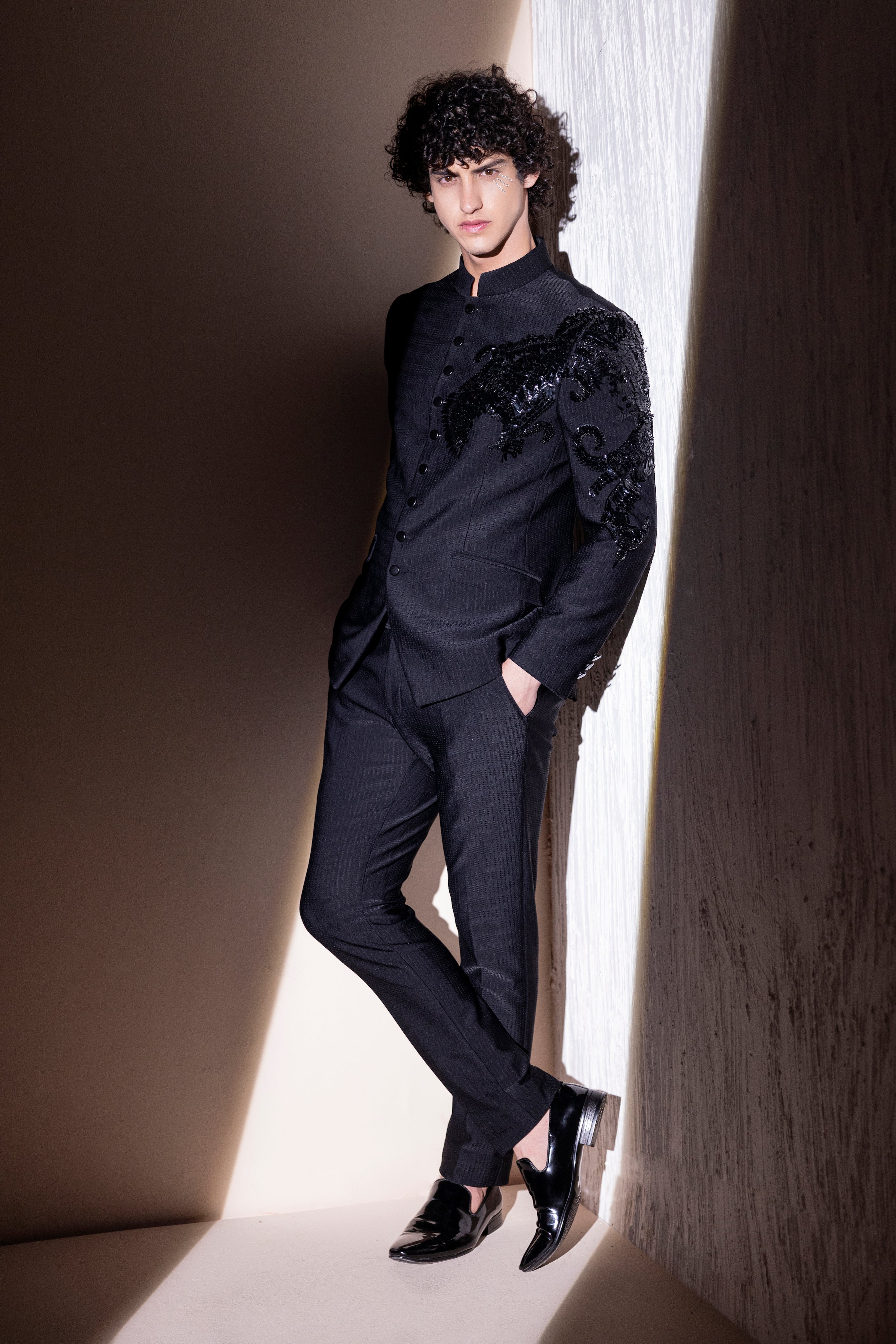 Hand embroidered Dragon motif jodhpuri paired with matching pants.