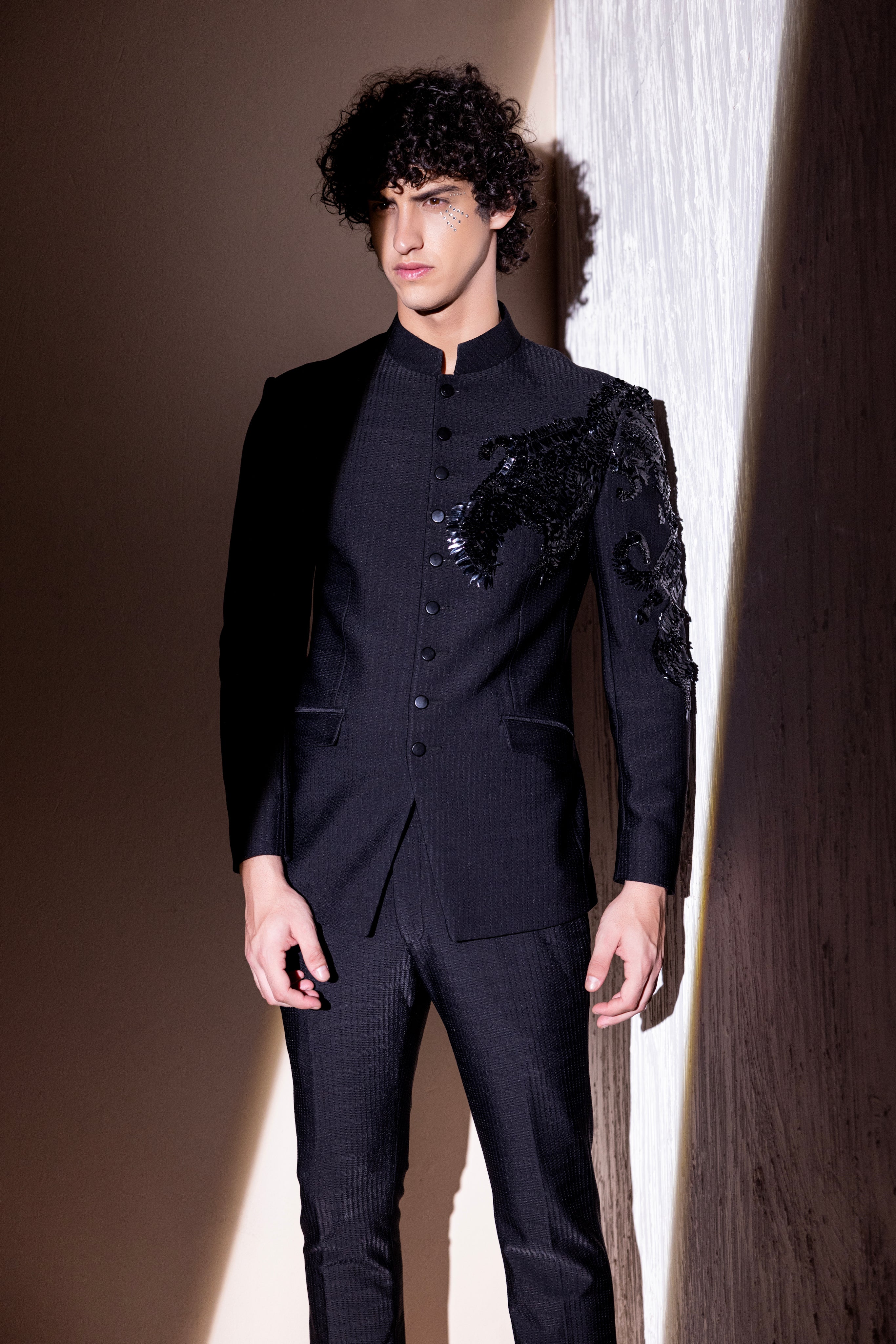 Hand embroidered Dragon motif jodhpuri paired with matching pants.