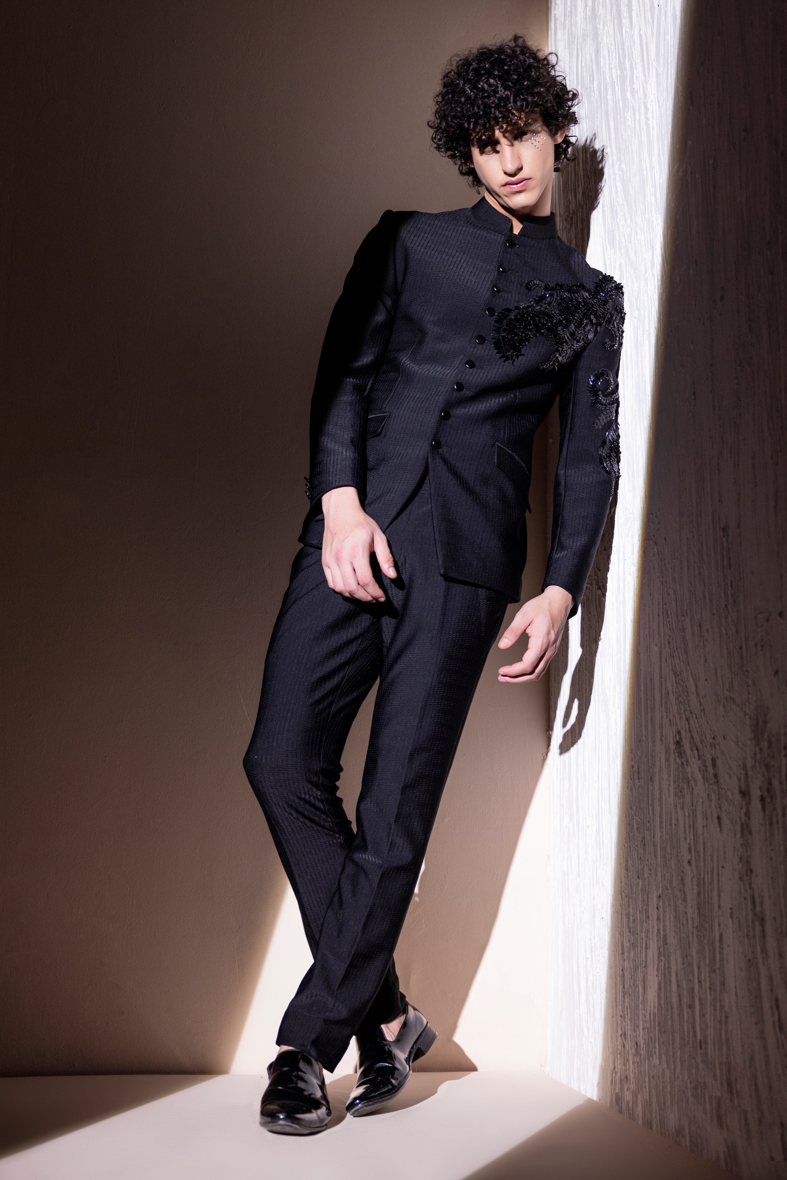 Hand embroidered Dragon motif jodhpuri paired with matching pants.