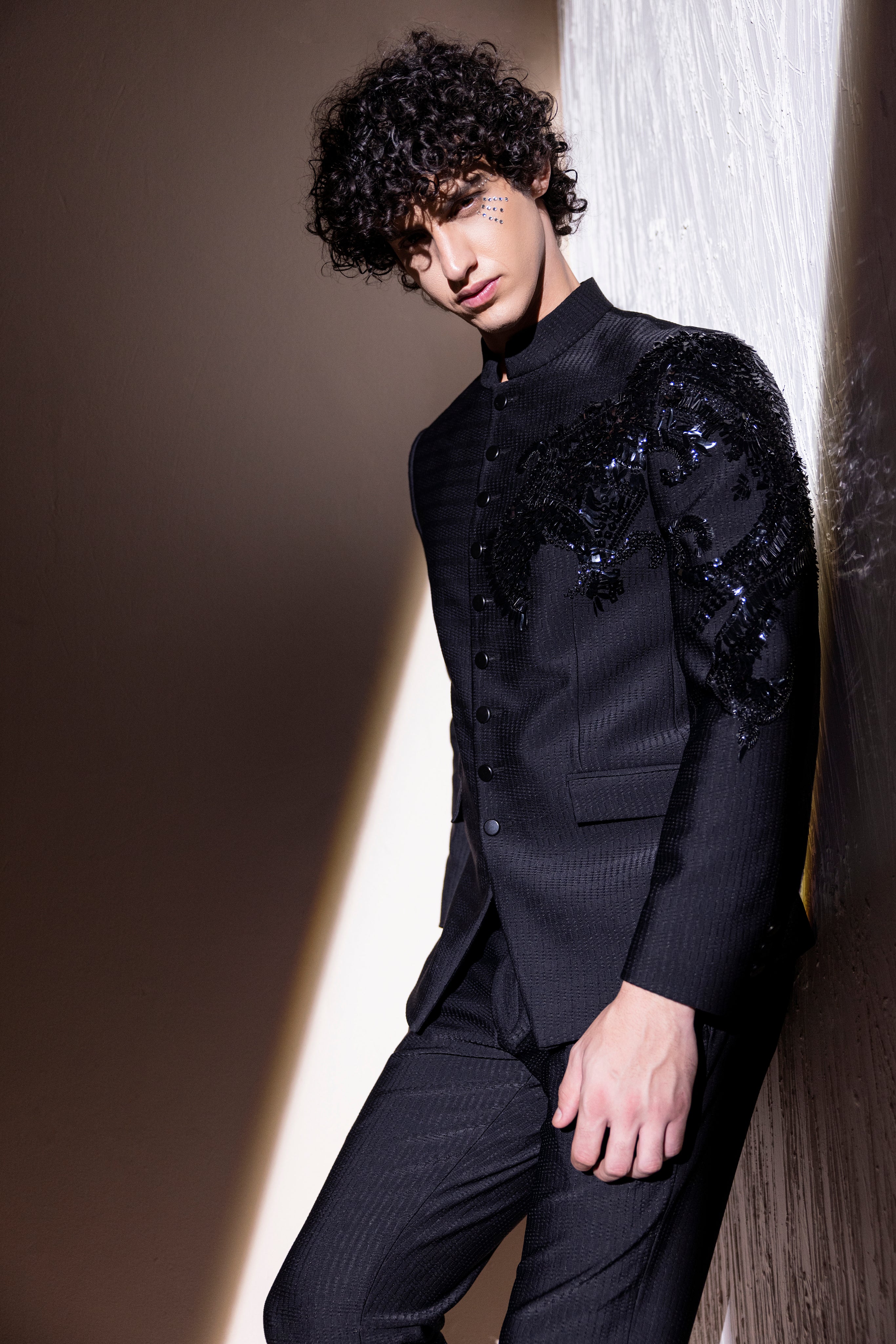 Hand embroidered Dragon motif jodhpuri paired with matching pants.