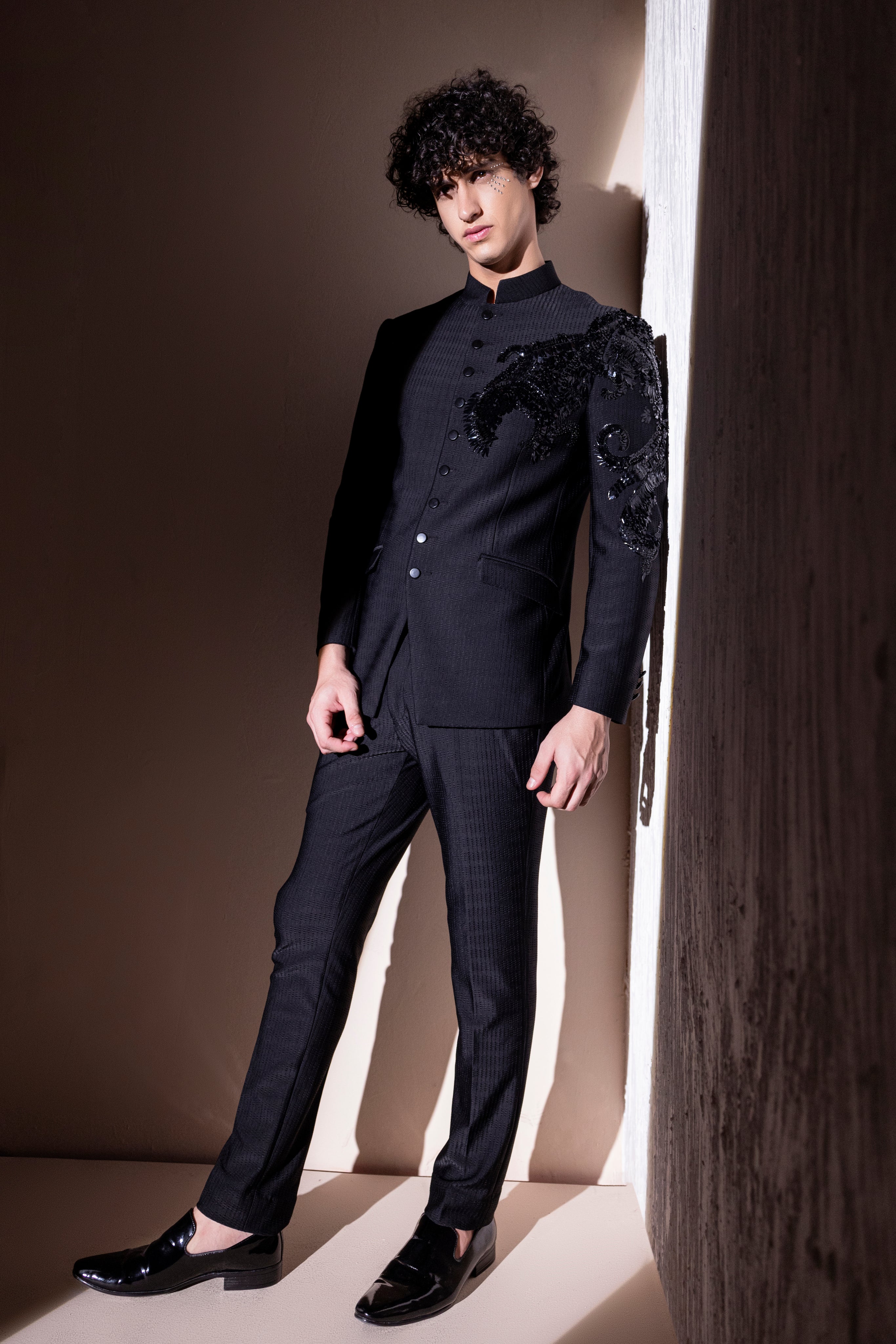 Hand embroidered Dragon motif jodhpuri paired with matching pants.