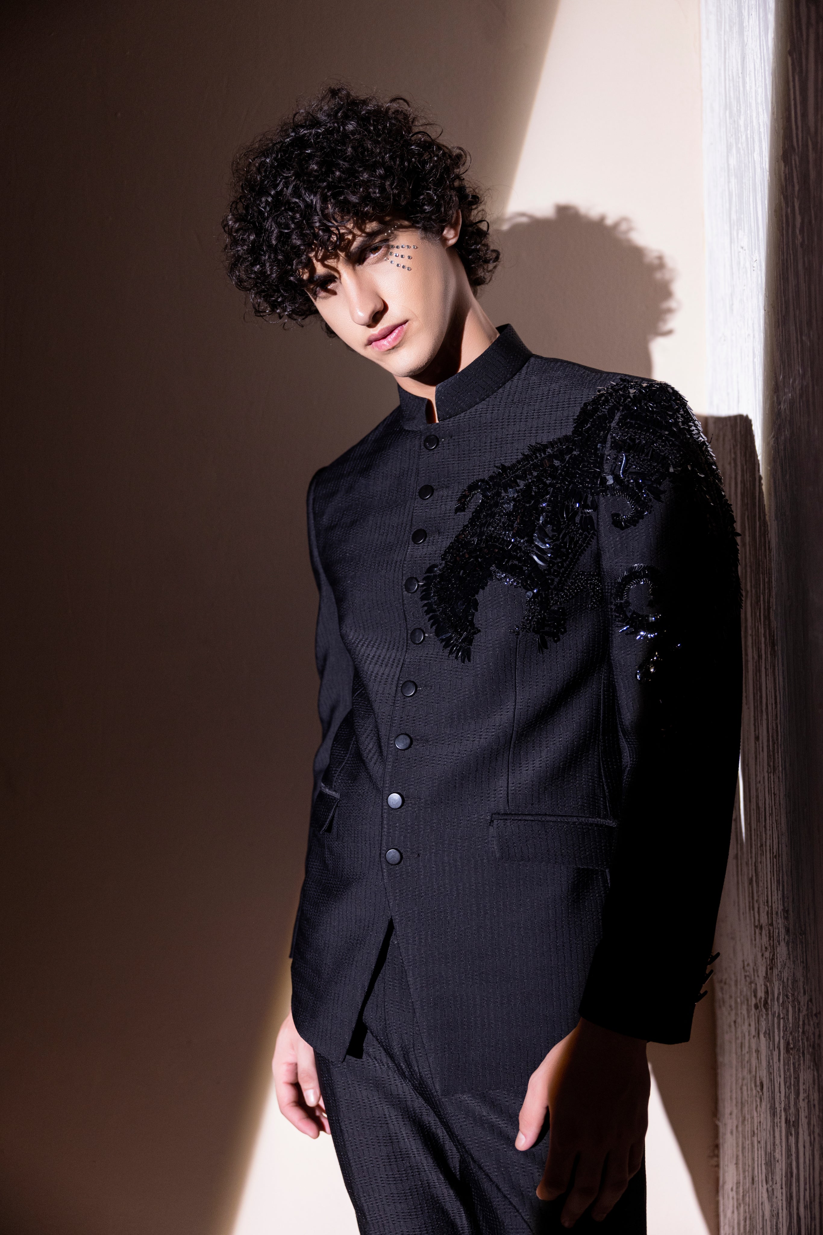 Hand embroidered Dragon motif jodhpuri paired with matching pants.
