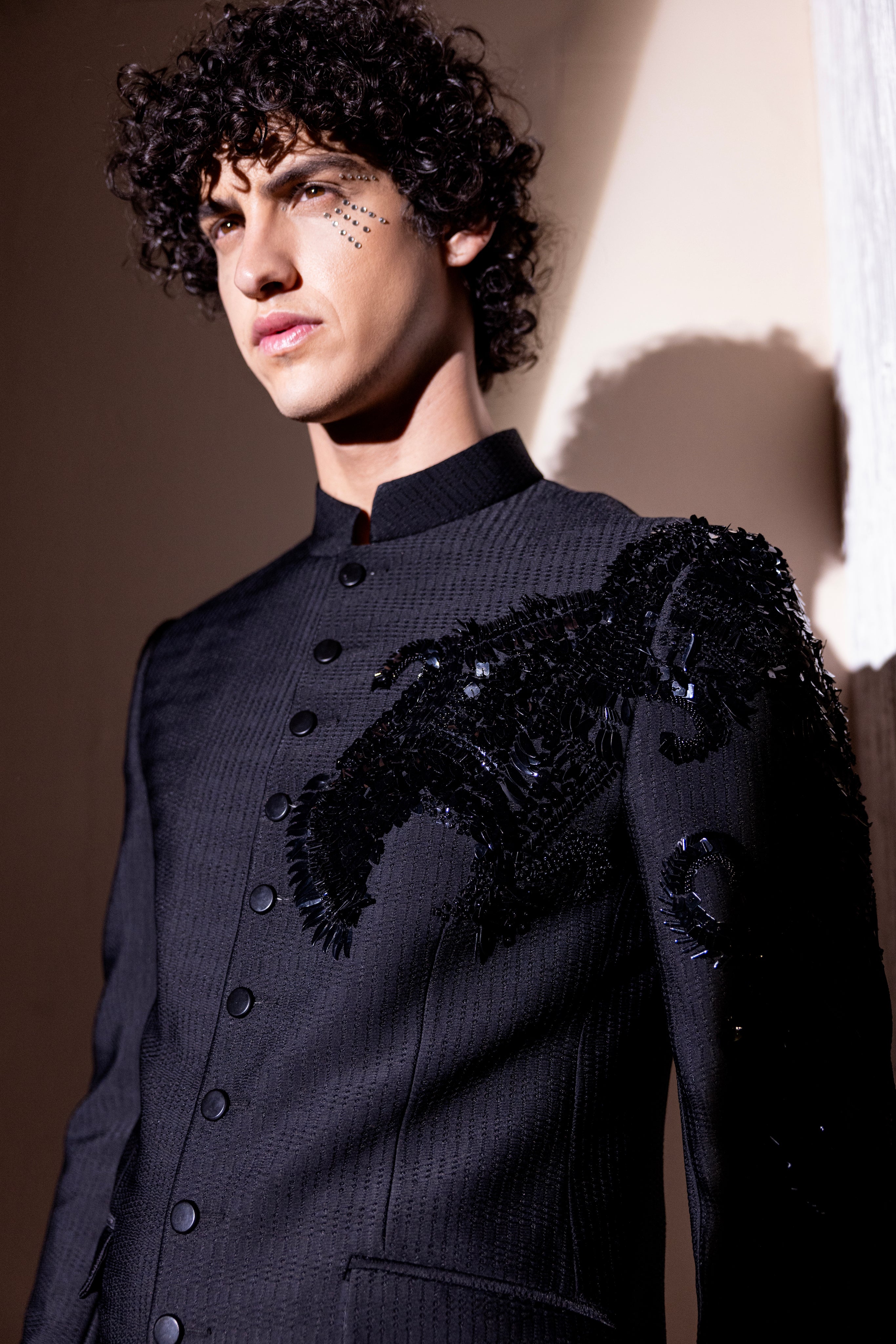 Hand embroidered Dragon motif jodhpuri paired with matching pants.