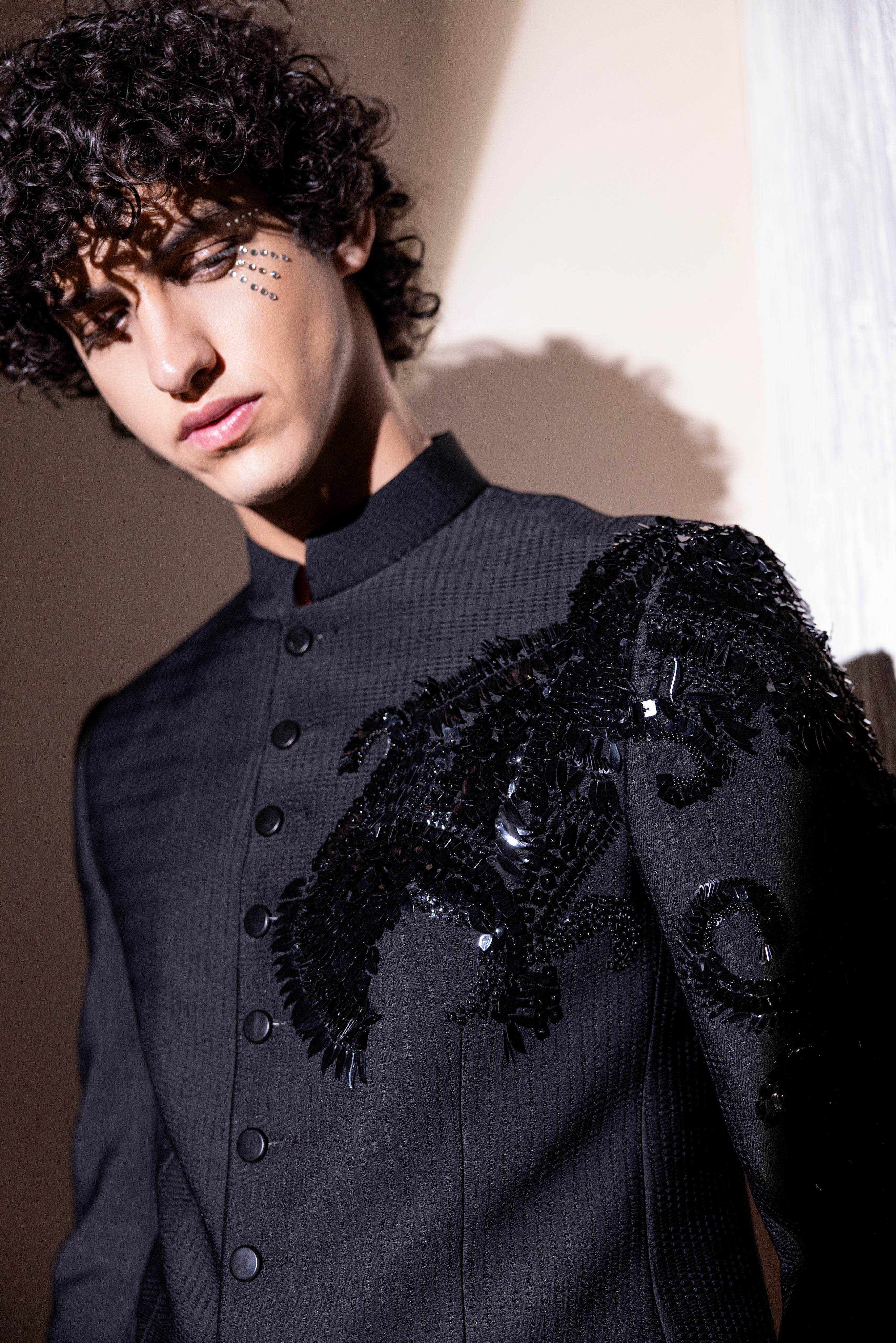 Hand embroidered Dragon motif jodhpuri paired with matching pants.