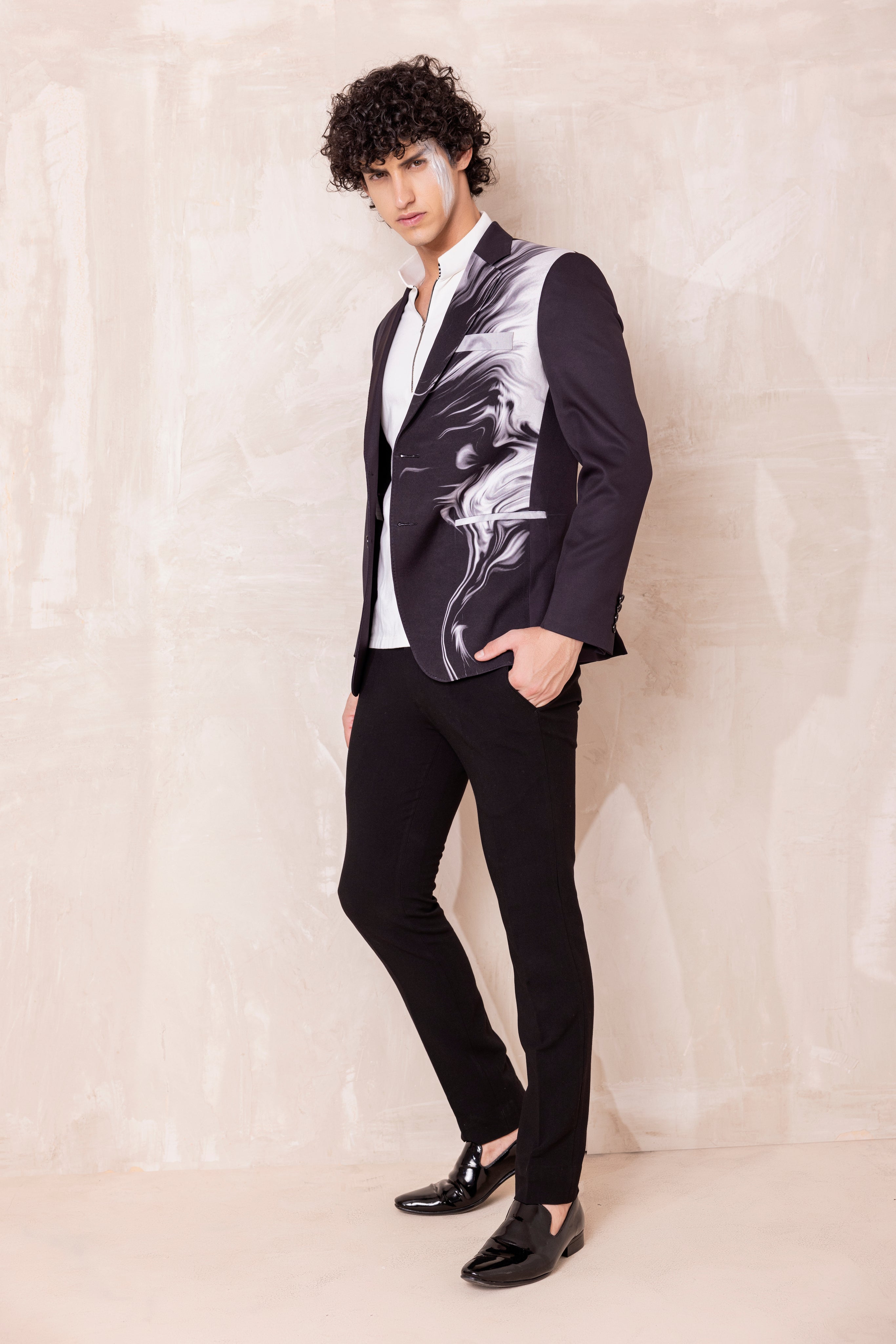 Digital print blazer with abstract design.