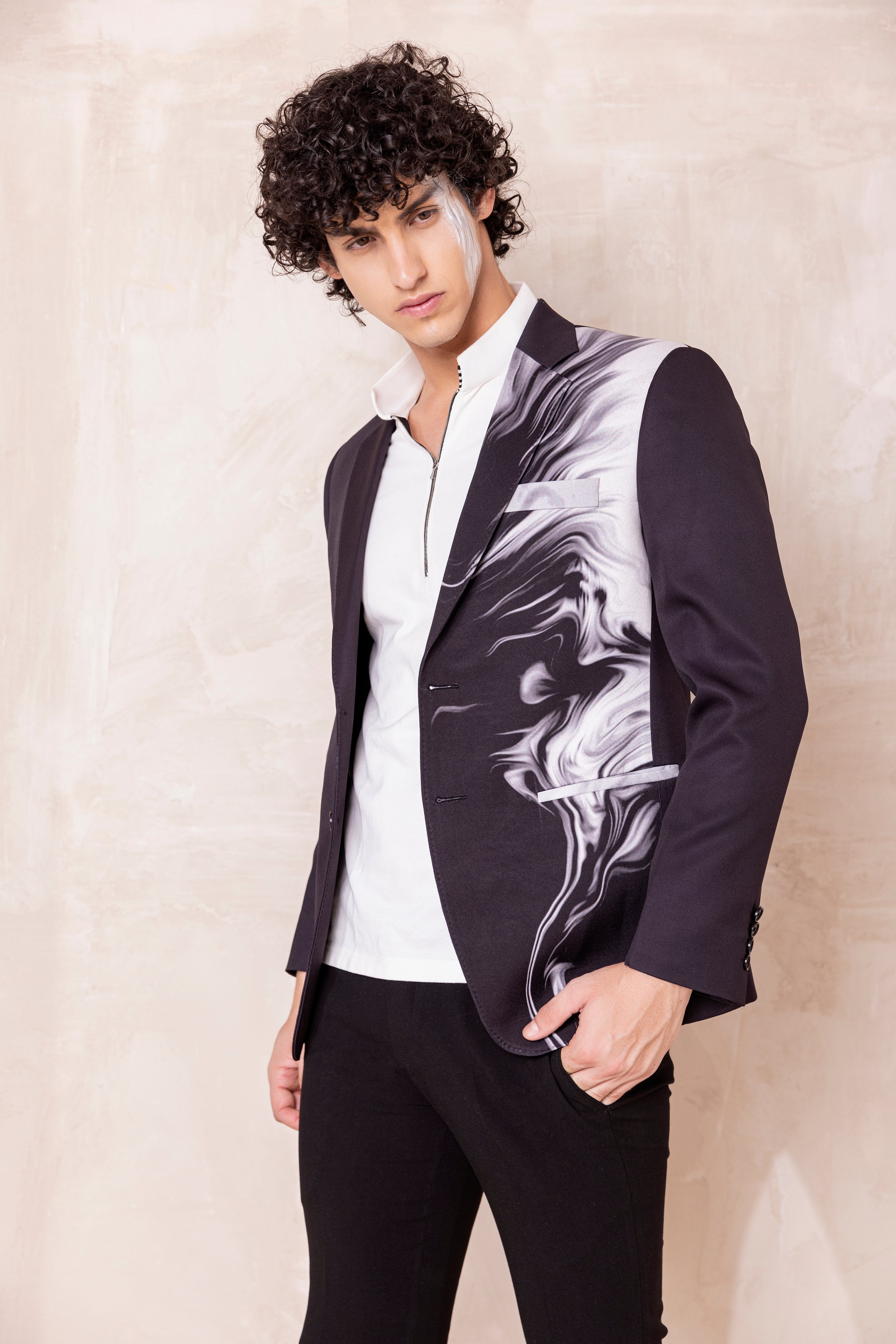 Digital print blazer with abstract design.