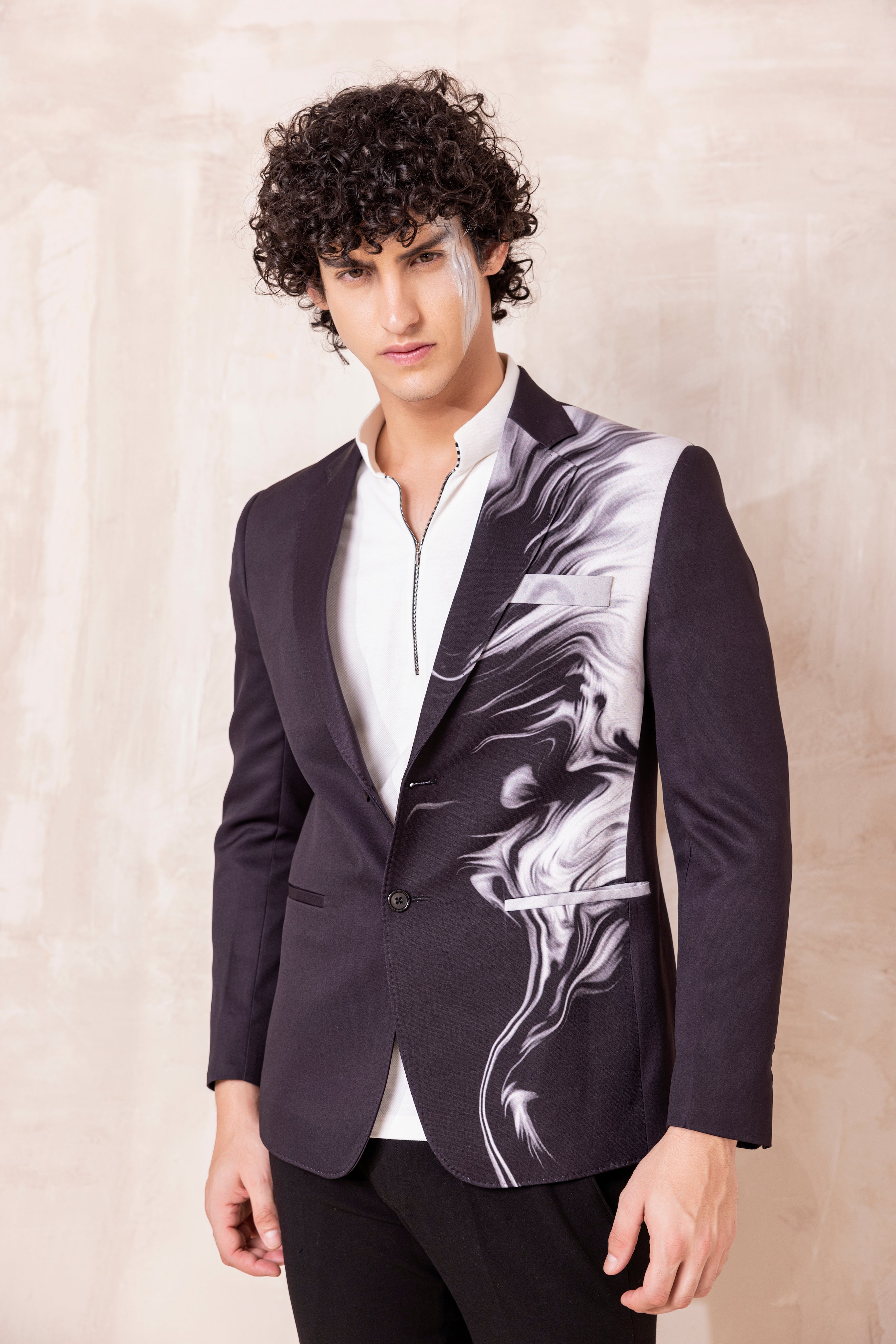 Digital print blazer with abstract design.