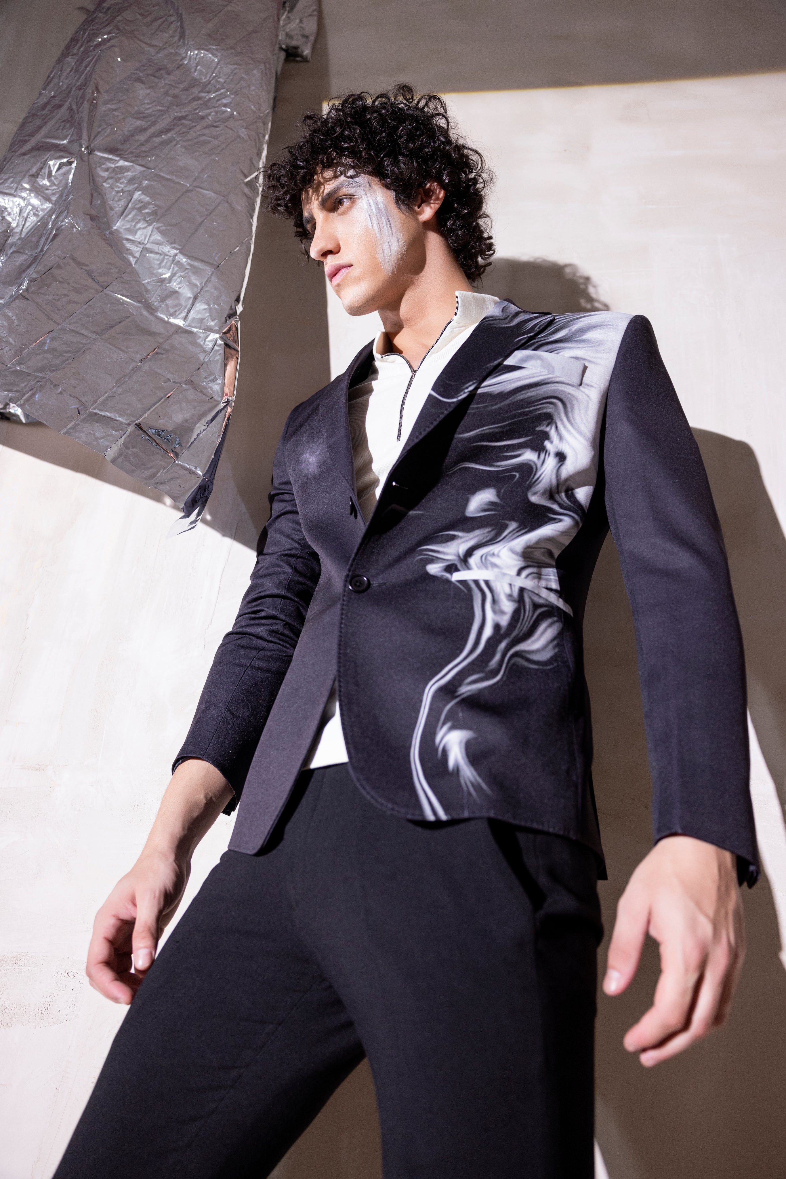 Digital print blazer with abstract design.